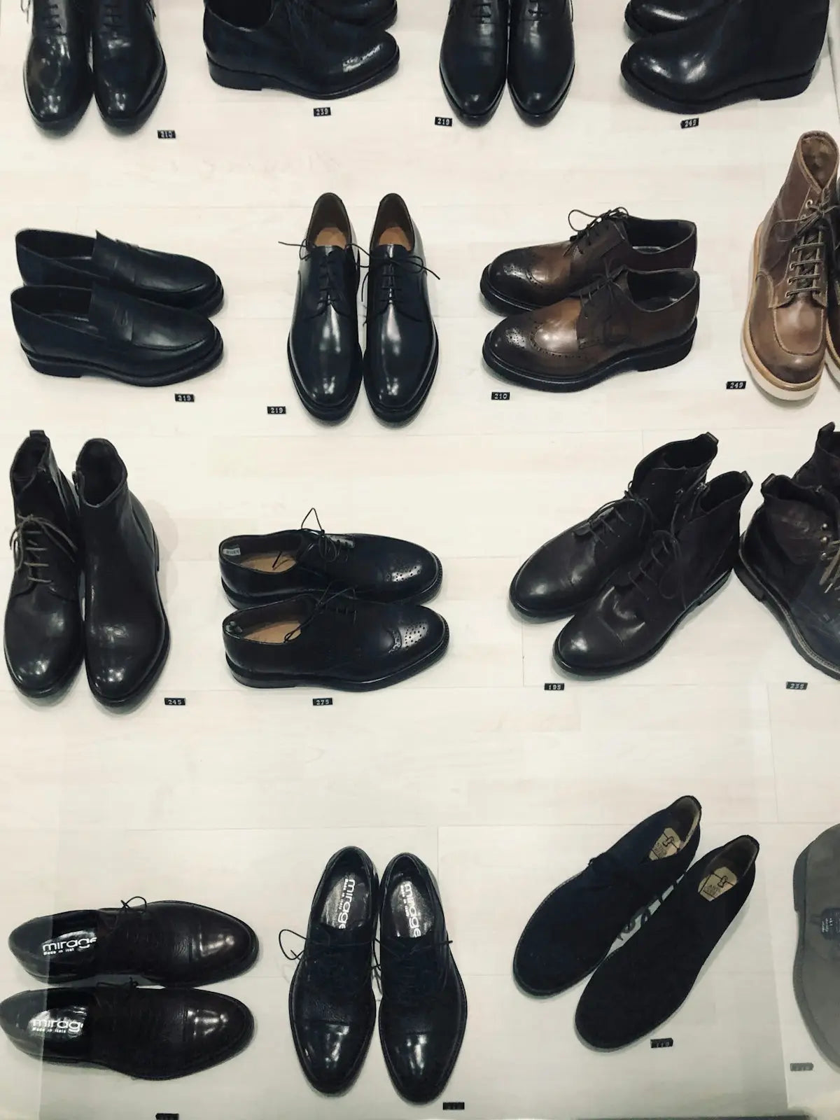 Classic black leather dress shoes with polished finish and lace-up design.