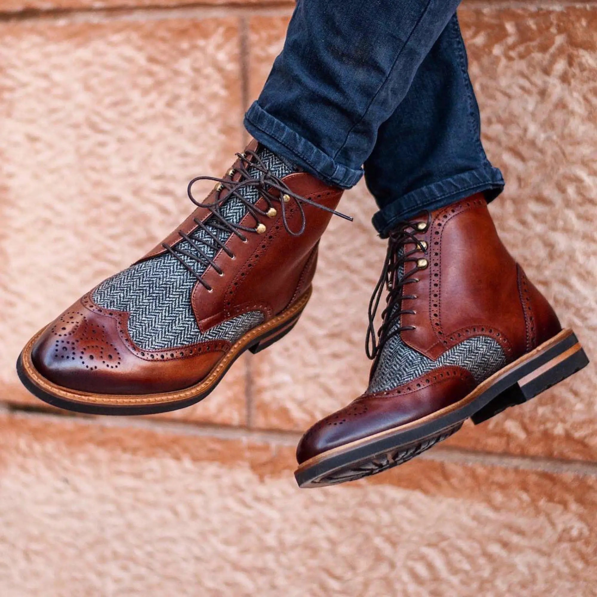 Brown leather and herringbone boots.