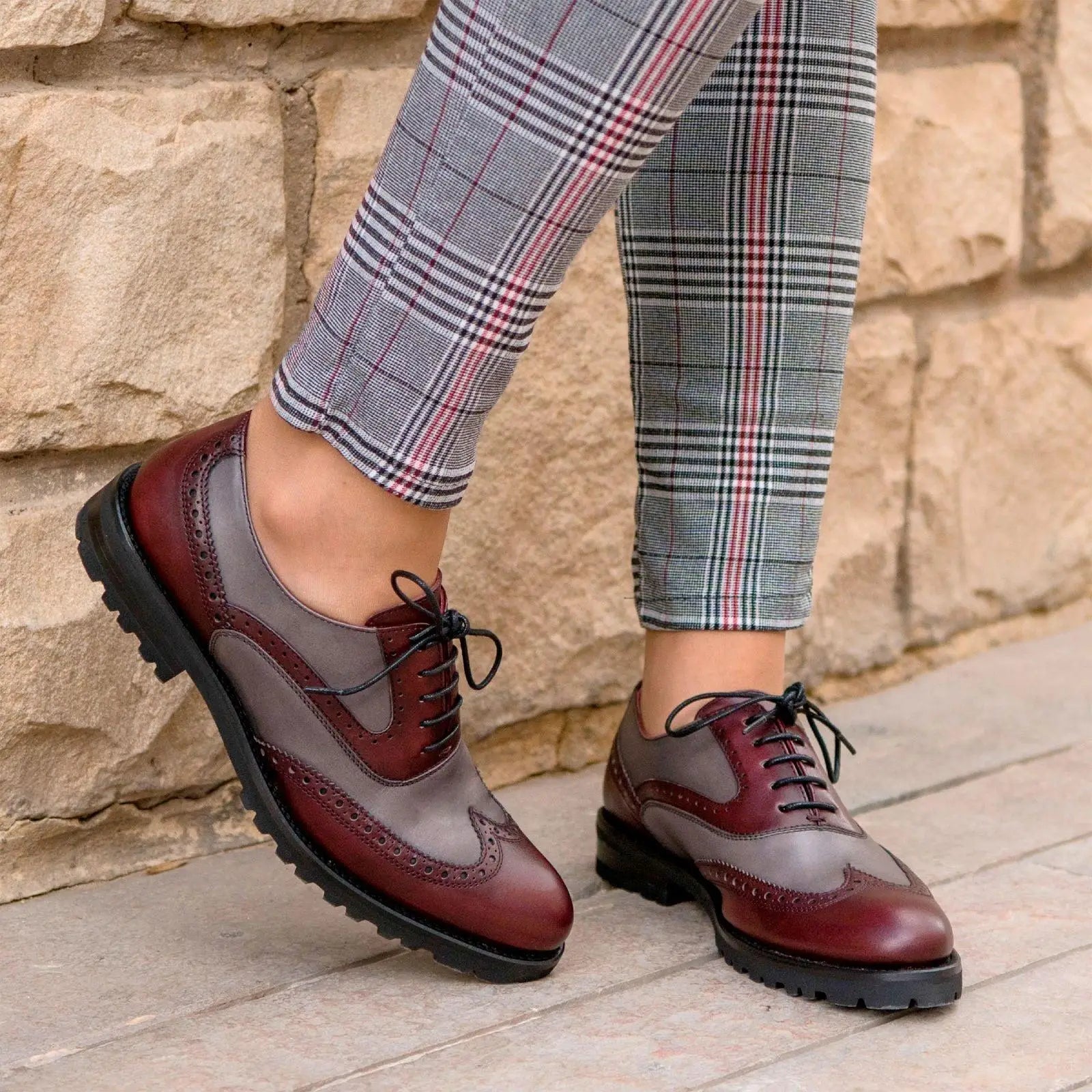 Two-tone wingtip dress shoes.
