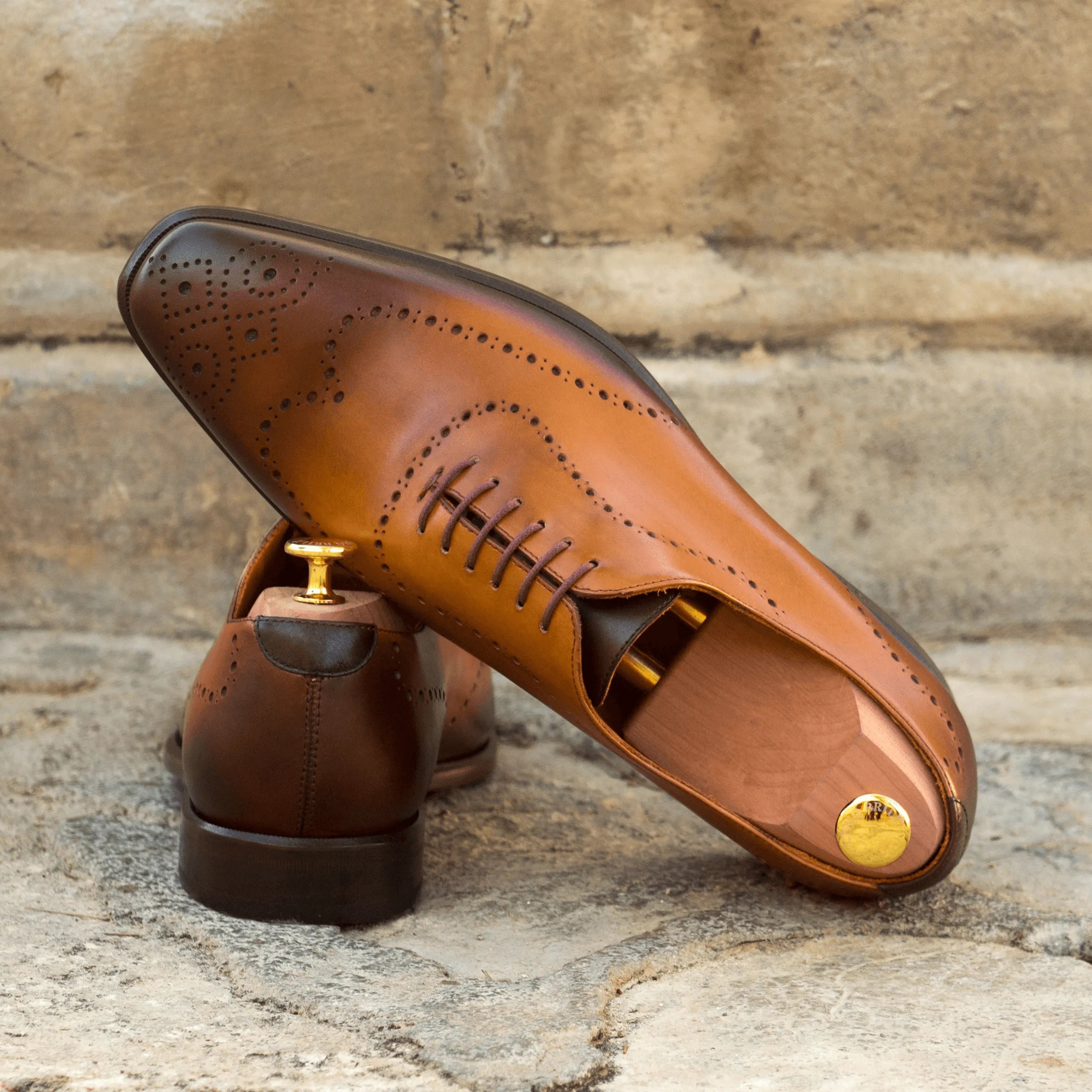 Brown Andrios wholecut shoes in leather dress style