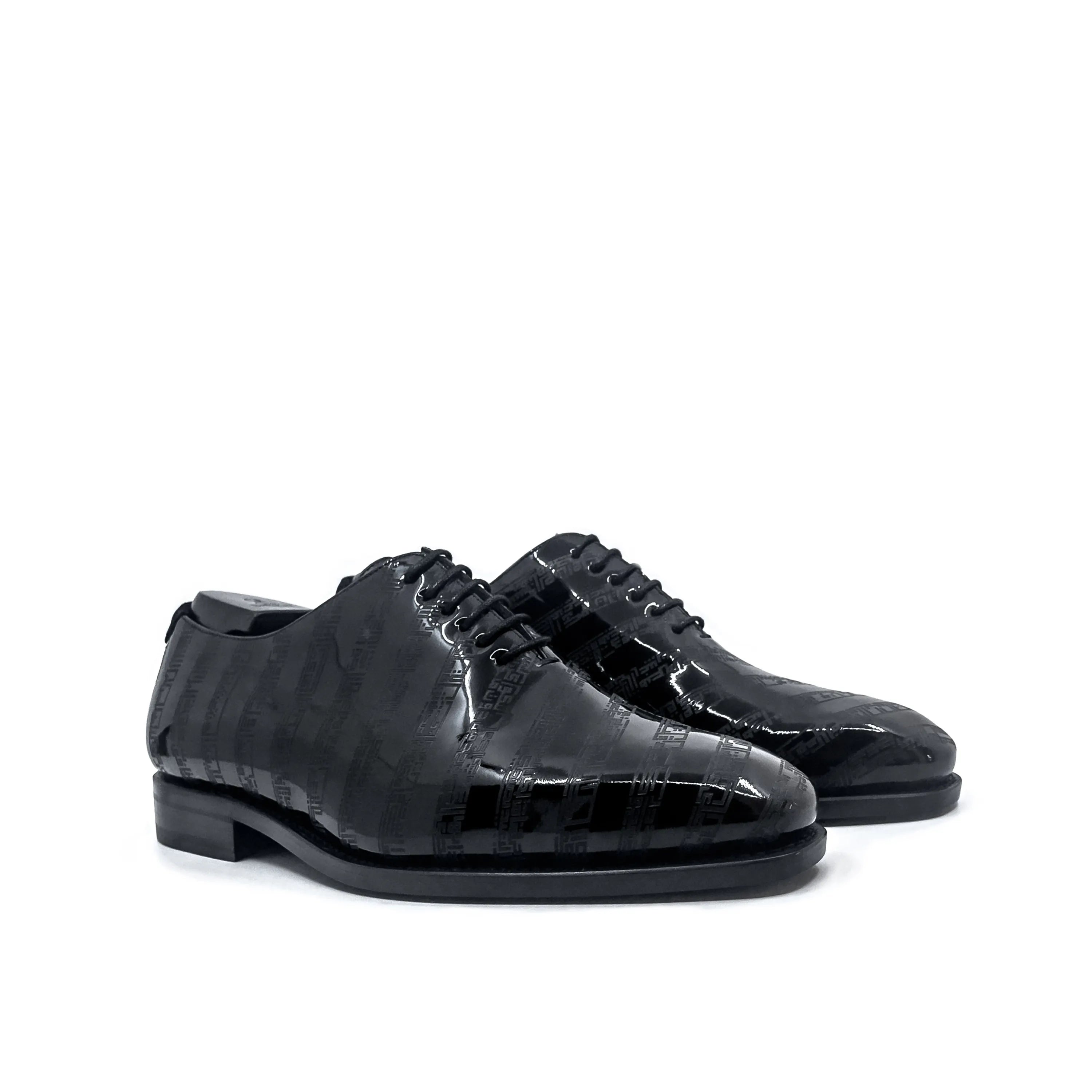 Pair of black patent leather Before The Throne wholecut shoes