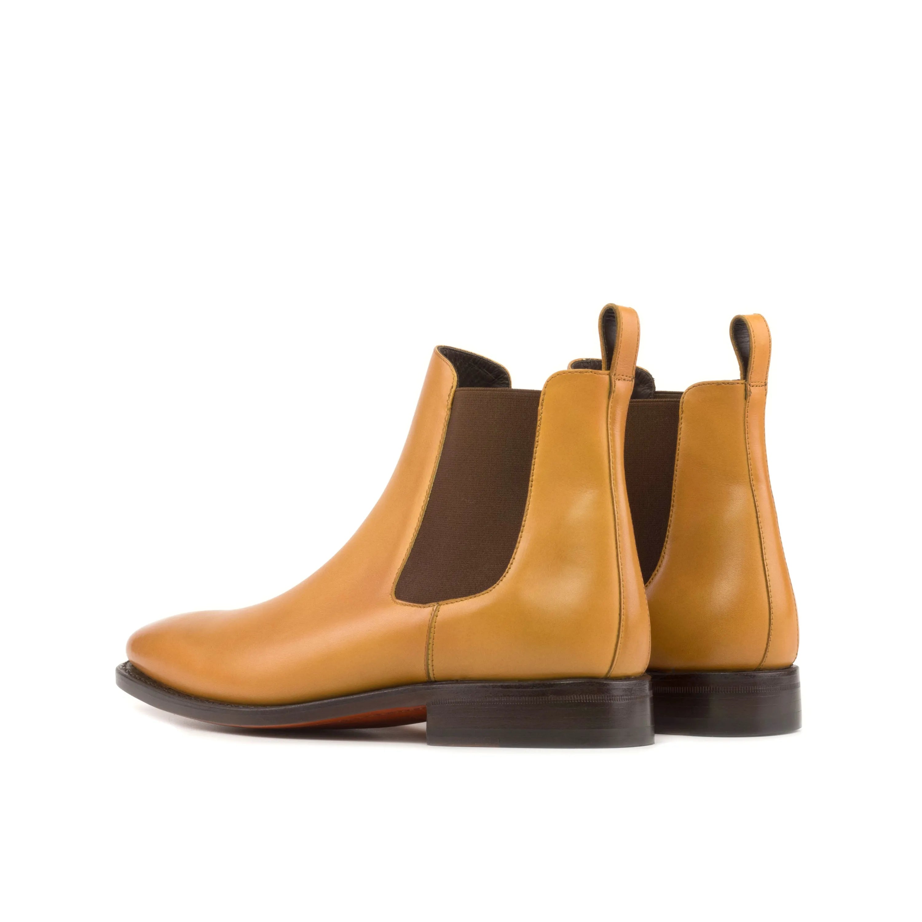 Pair of tan leather Canni Chelsea Boots in fast lane style
