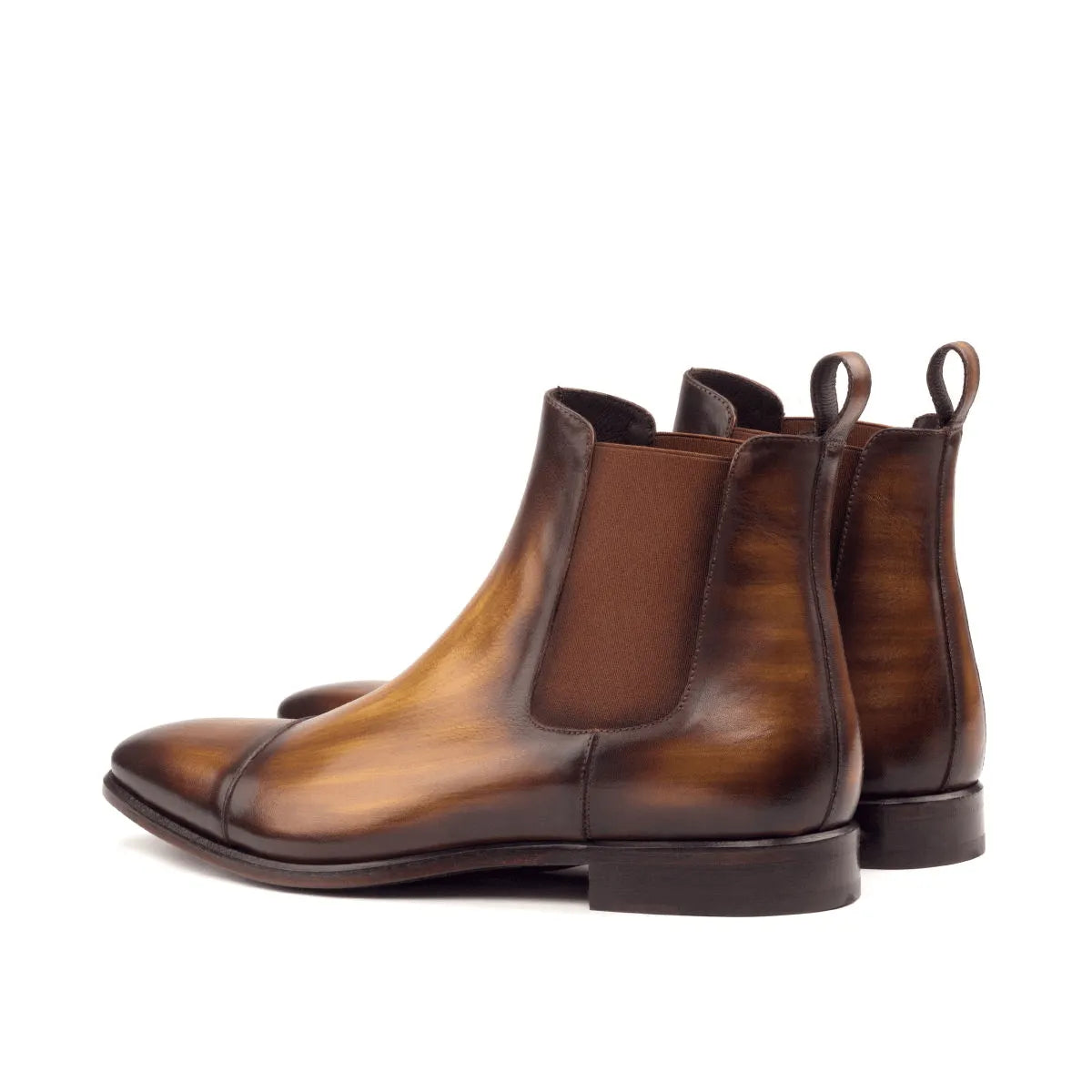 Caratacos patina Chelsea boots in brown leather back view