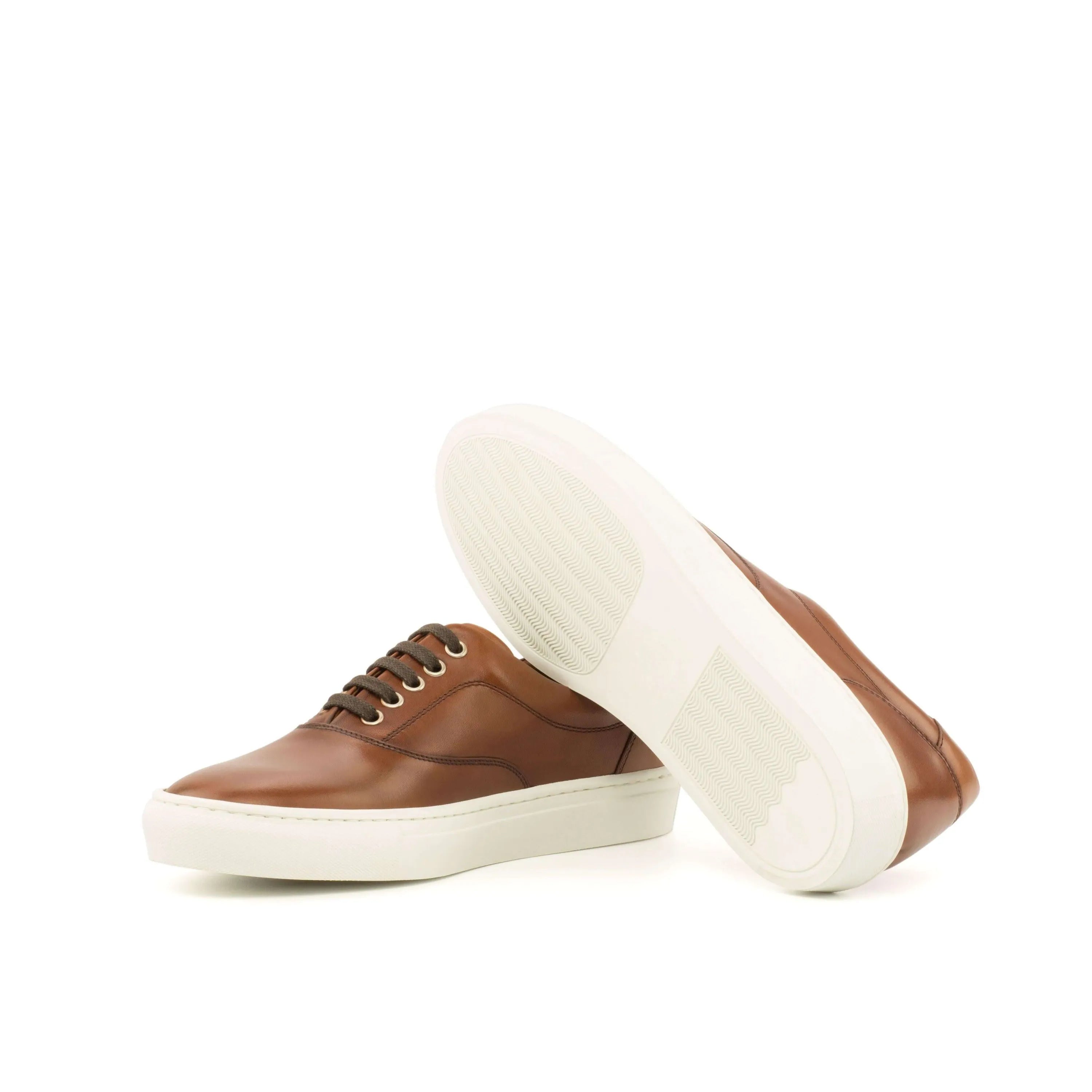 Pair of brown leather Cassian sider sneakers for men