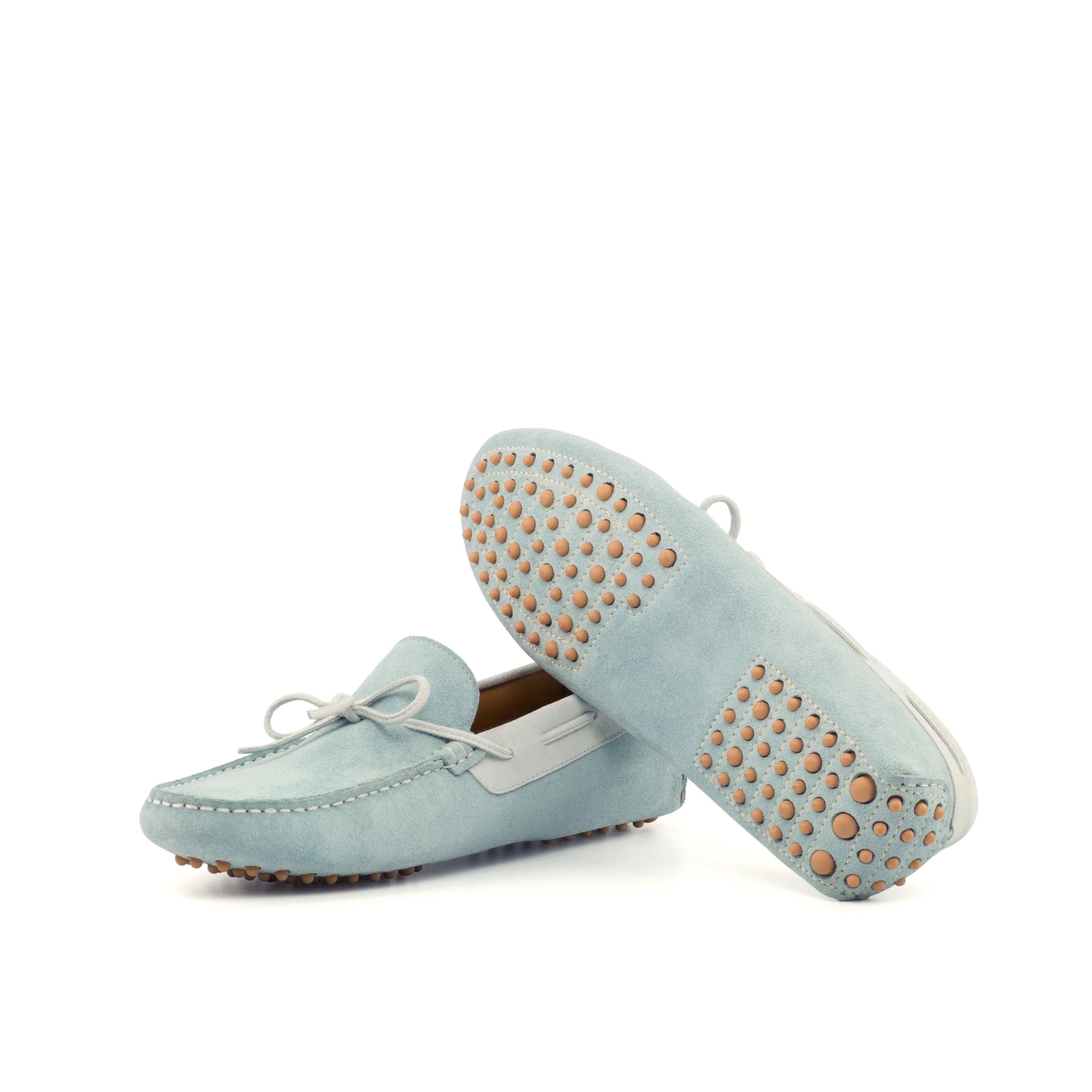 Tod’s light blue Egypt Driver II suede moccasin with gold studs