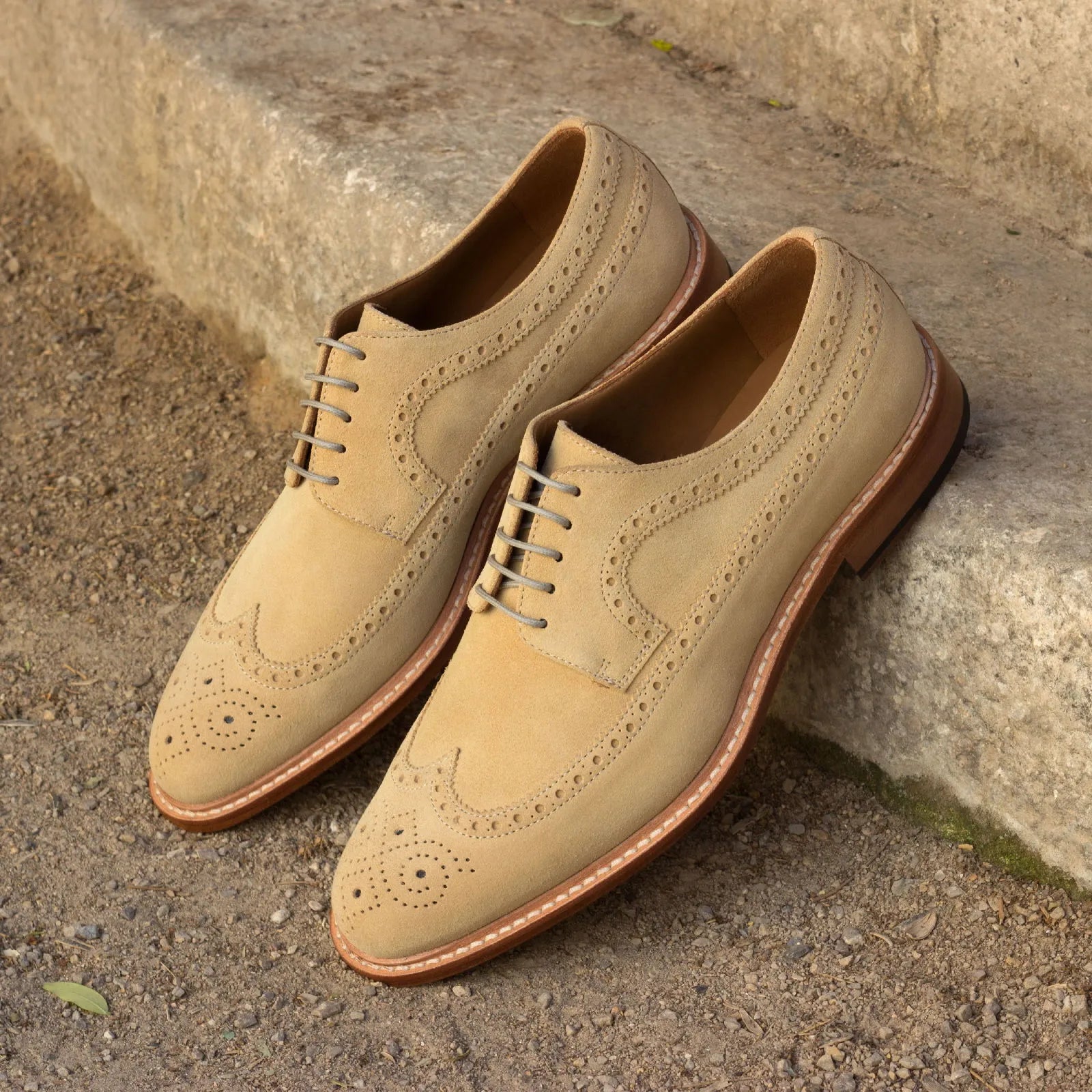 Erie Longwing Blucher tan suede wingtip dress shoes pair