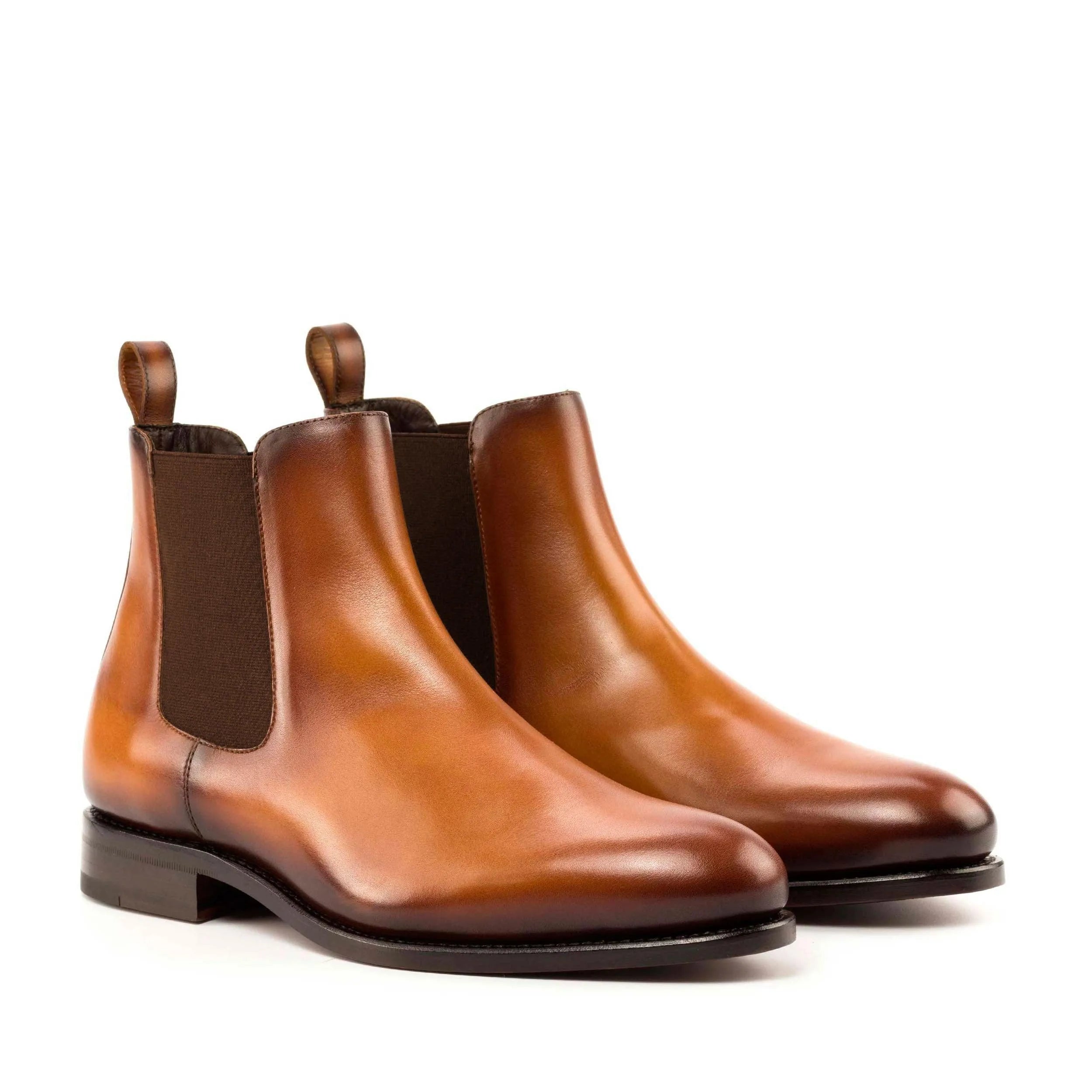 Pair of brown leather Fando Chelsea Boots in fast lane style