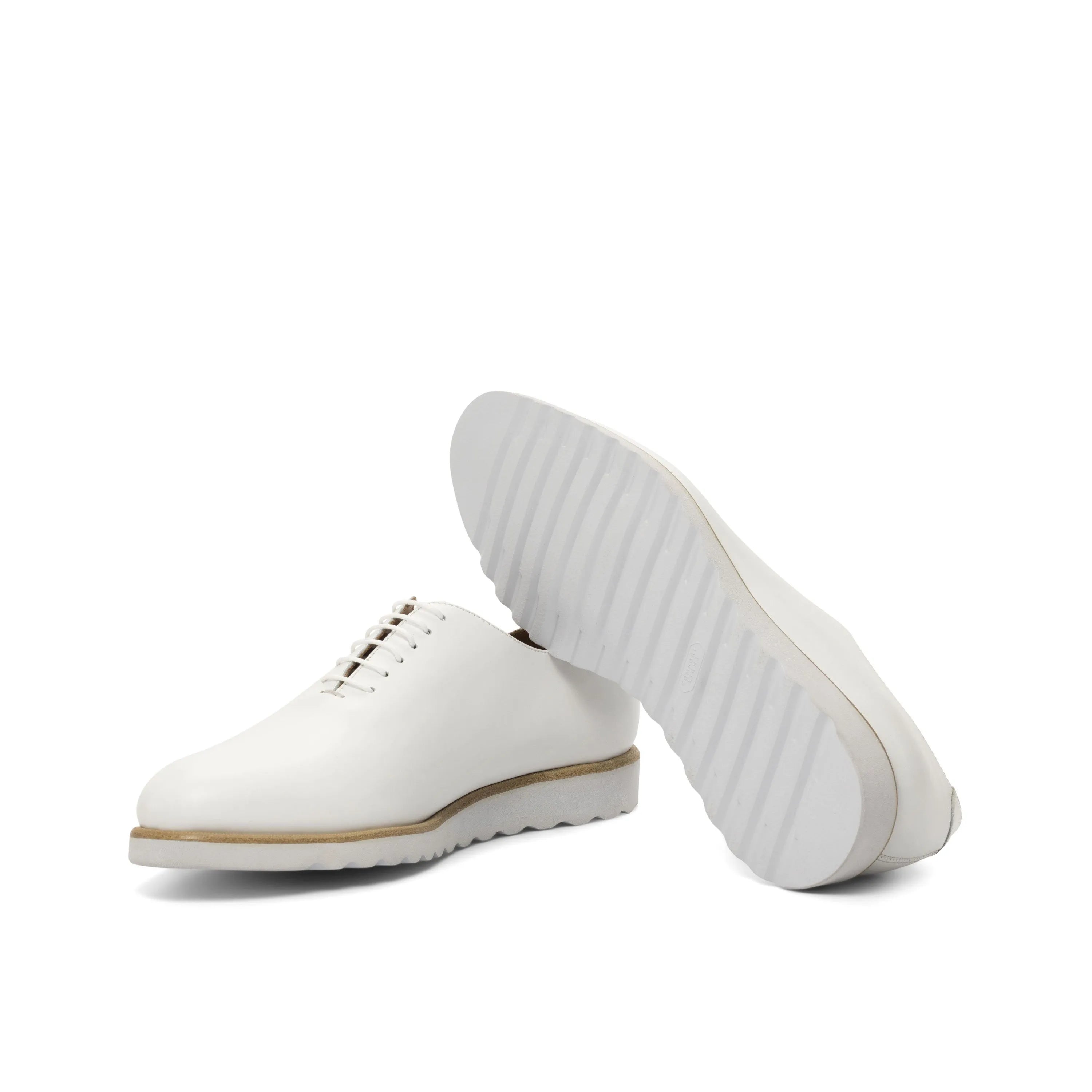 Fazo Wholecut pair of white leather luxury bespoke shoes for men