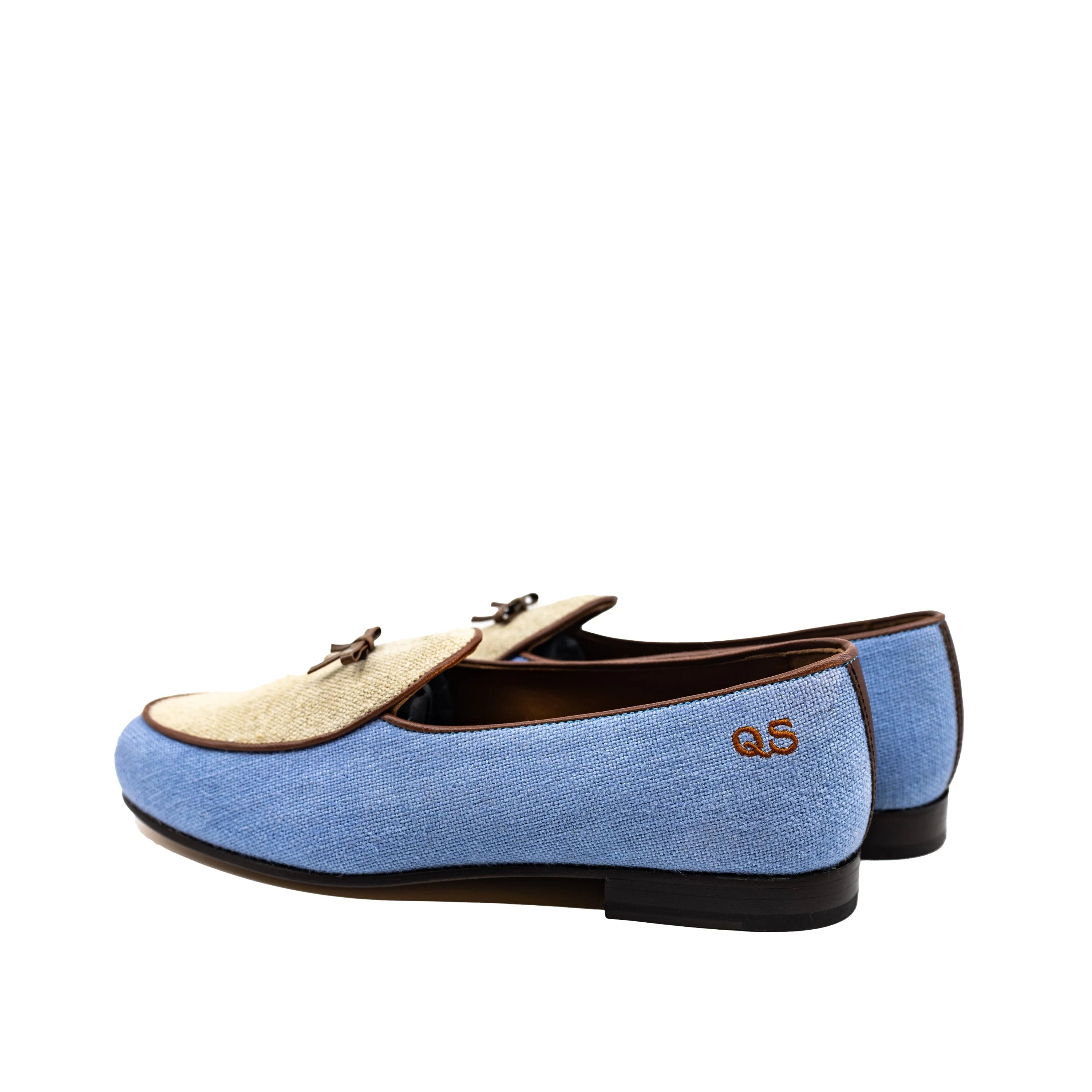 Back view of Fernandez Belgian Slipper: light blue suede loafers with gold accents and QS monogram on heel
