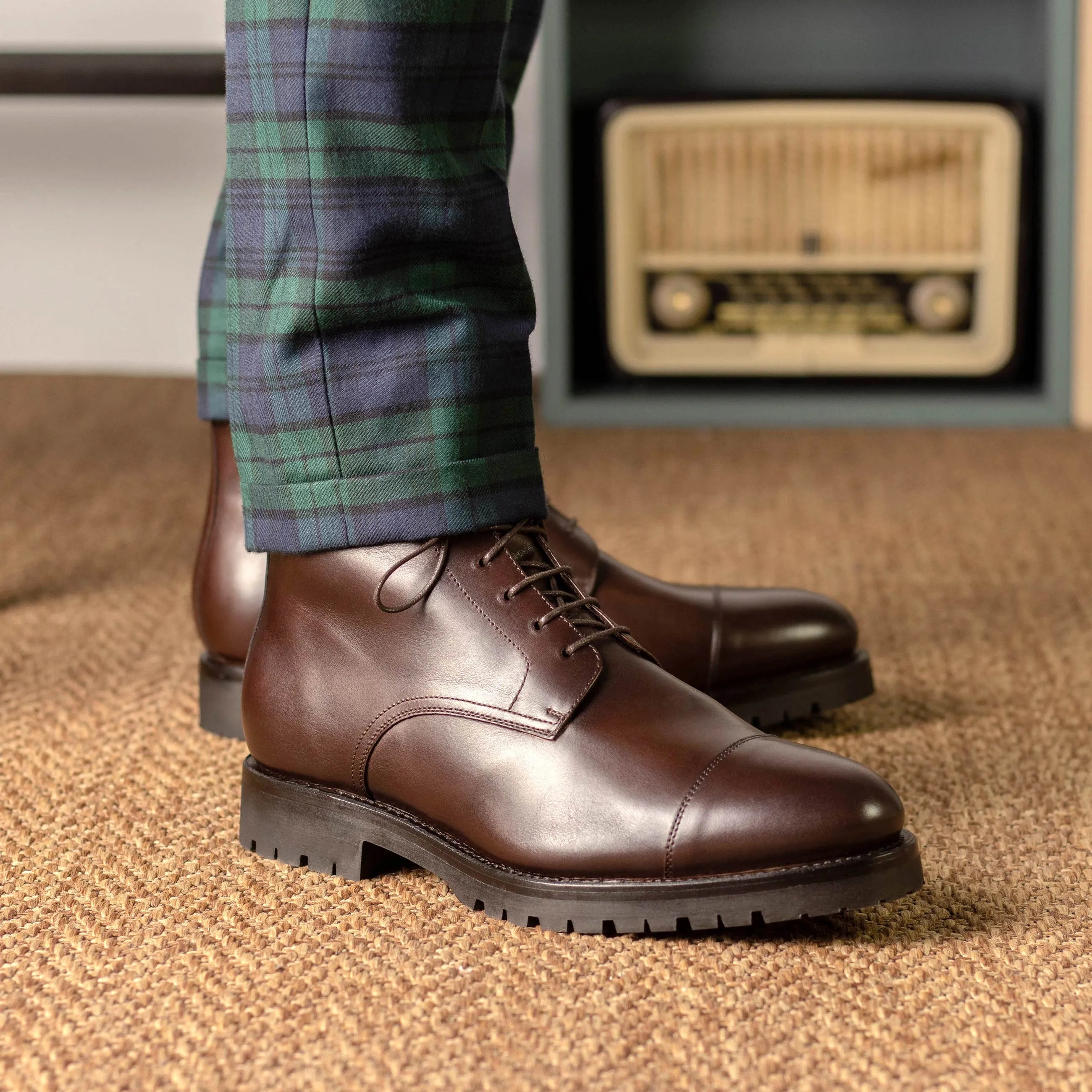 Brown leather cap-toe Geeva Jumper Boots in Fast Lane style