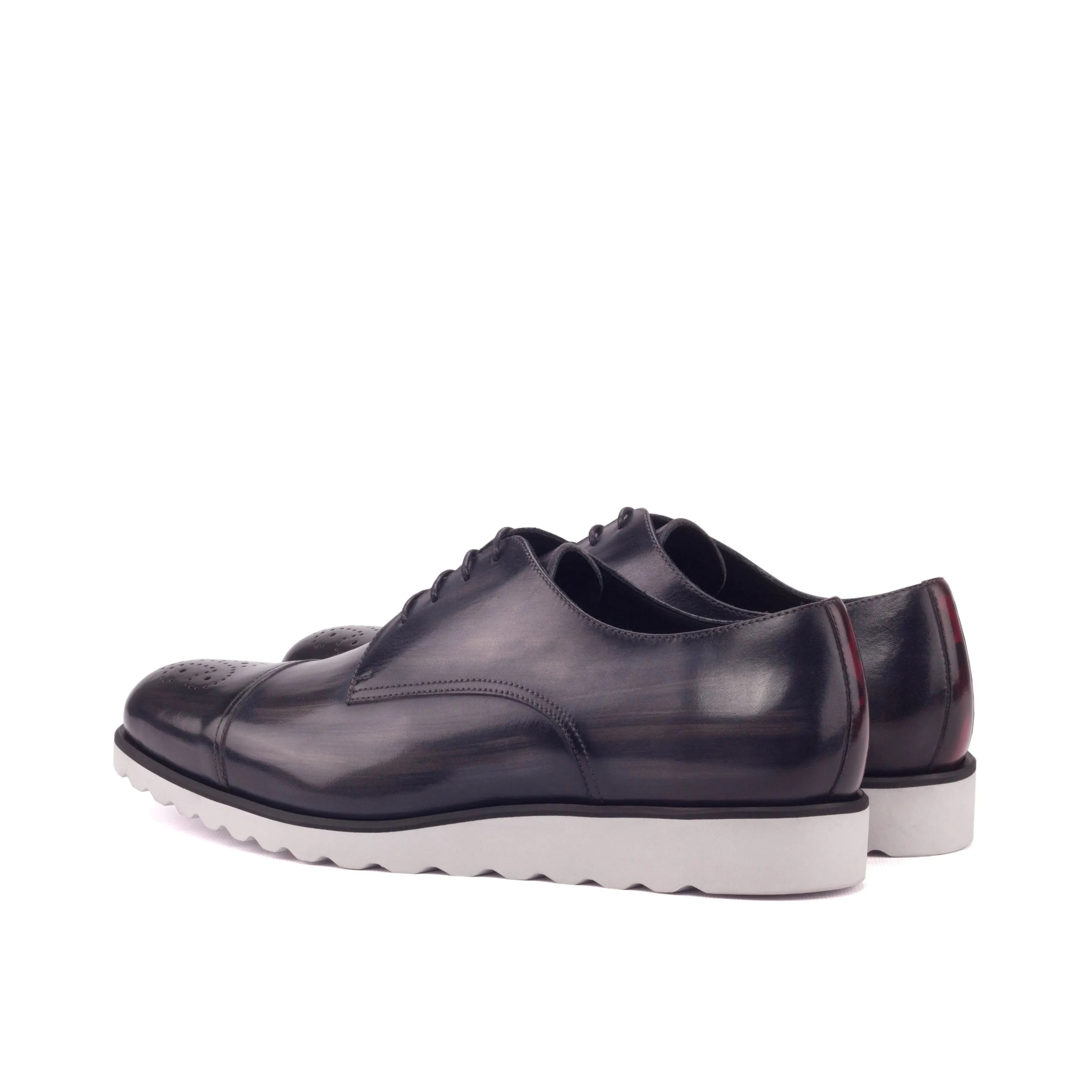 Griffith patina derby shoes: pair of navy leather dress shoes