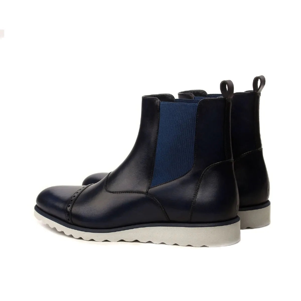 Hardwin Chelsea boots: navy blue leather pair with white soles