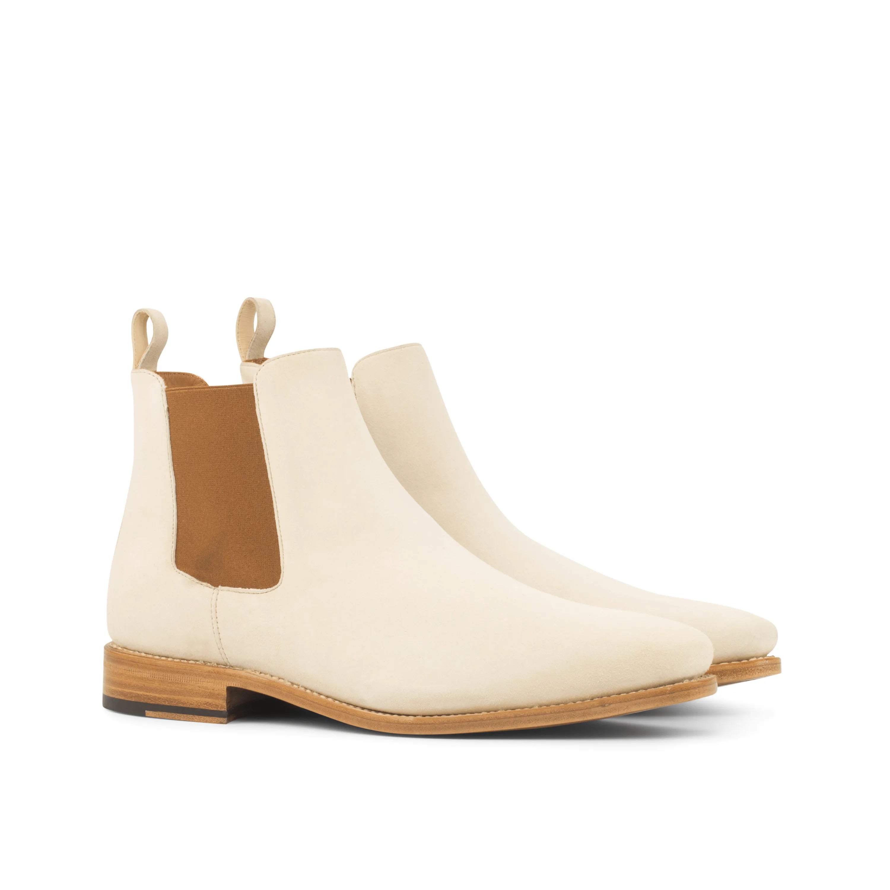 Pair of cream-colored Kangee Chelsea Boot back view