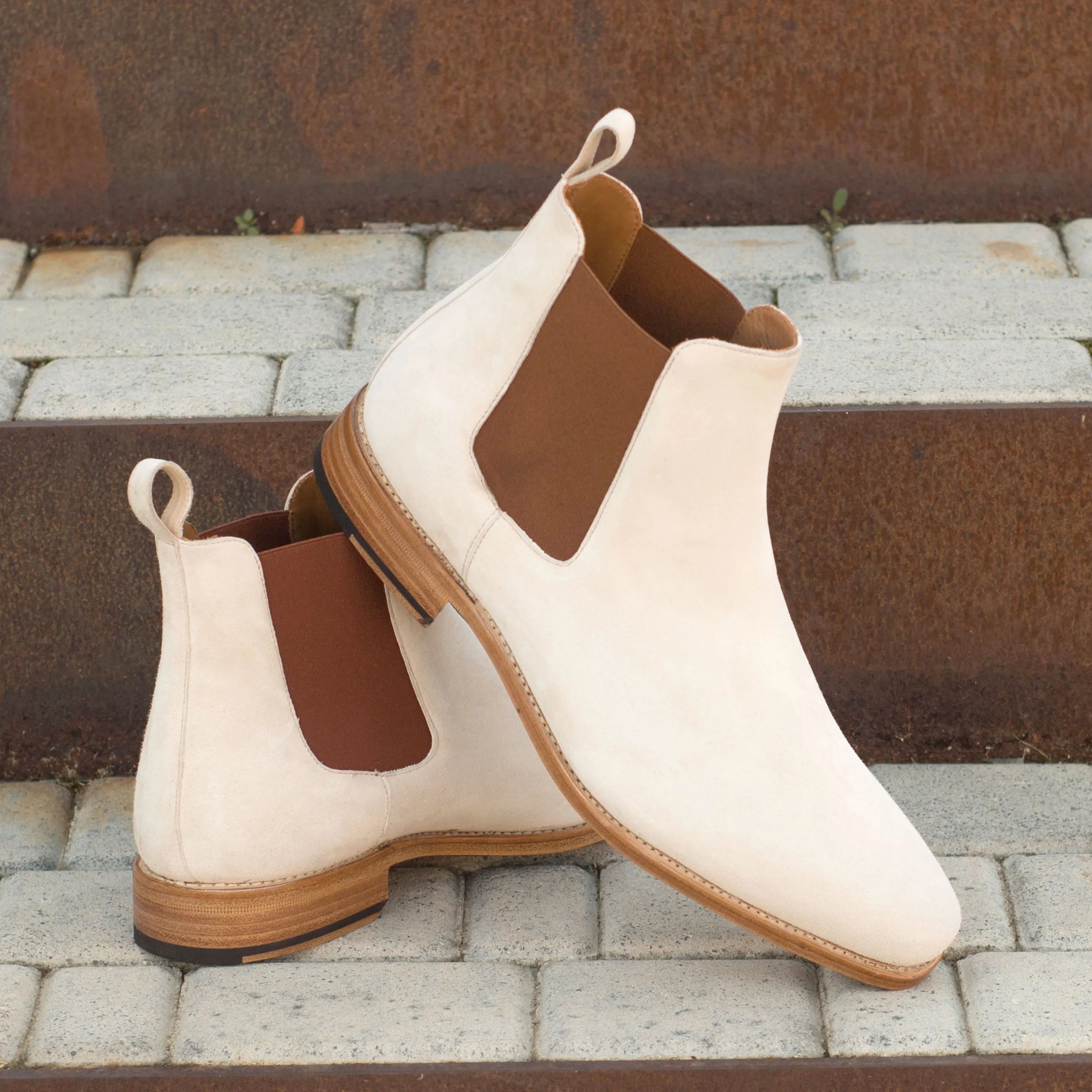 Pair of white suede Kangee Chelsea boots