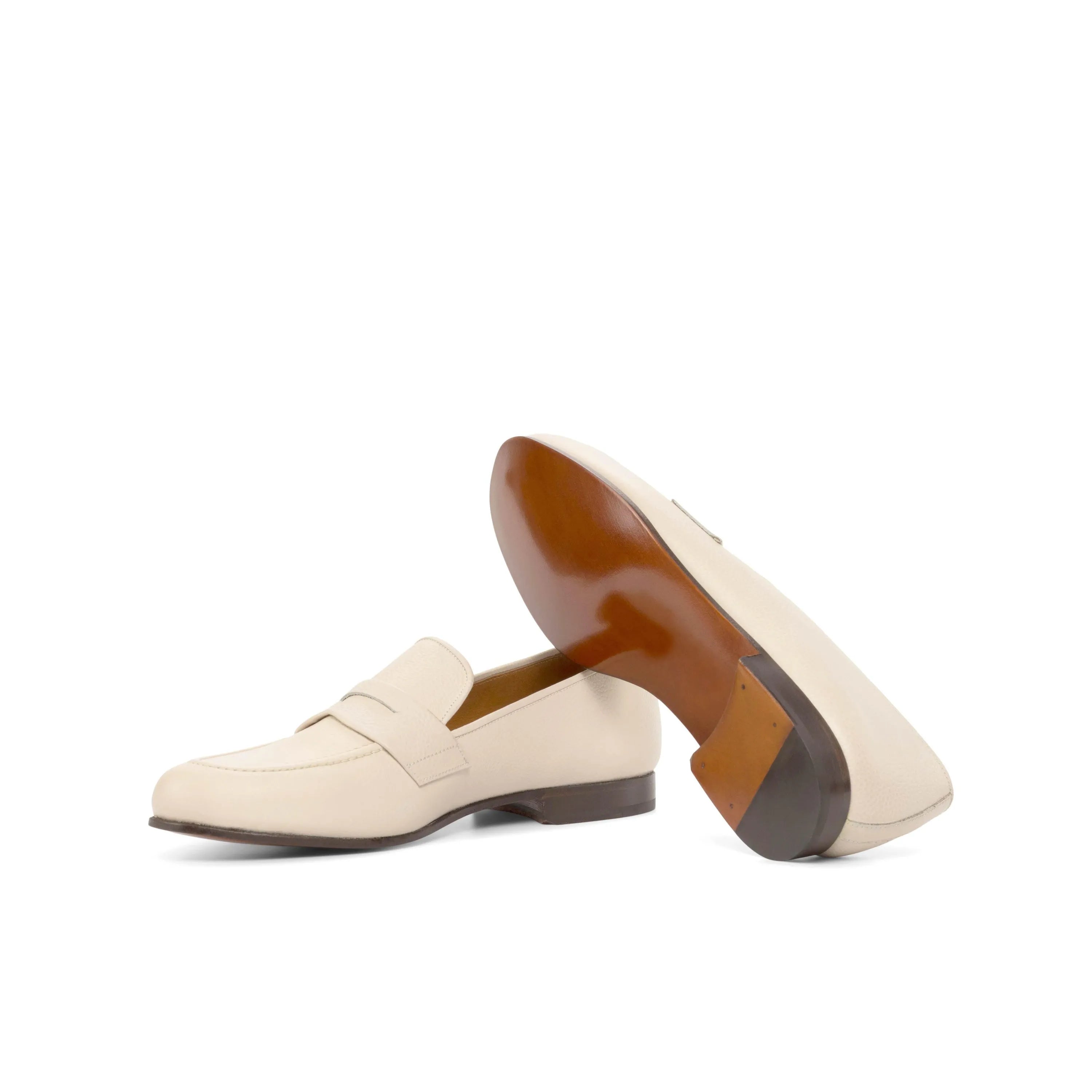 Pair of cream-colored leather Olgo Wellington slip-on loafers