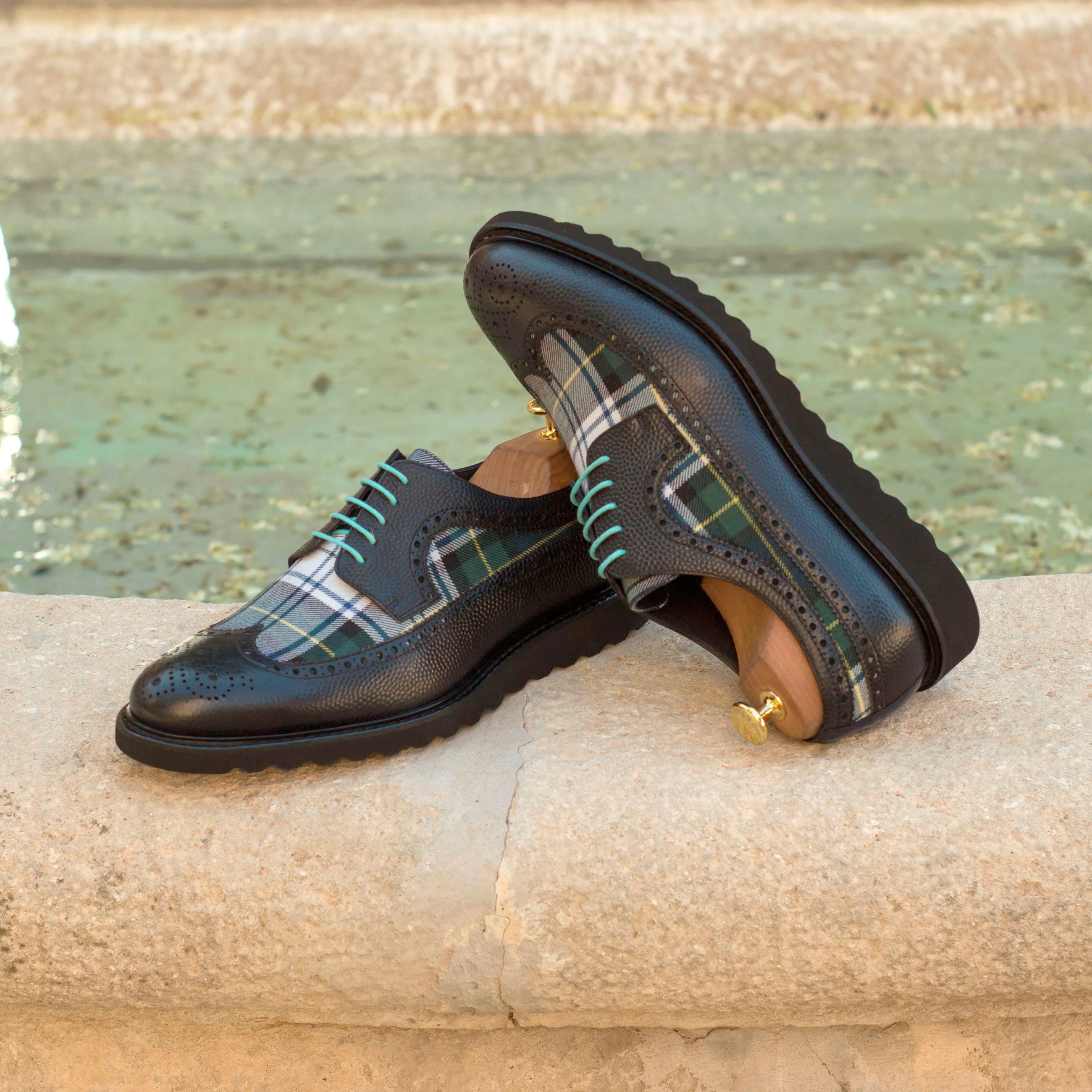 Seleucid longwing blucher in black leather and plaid dress shoes