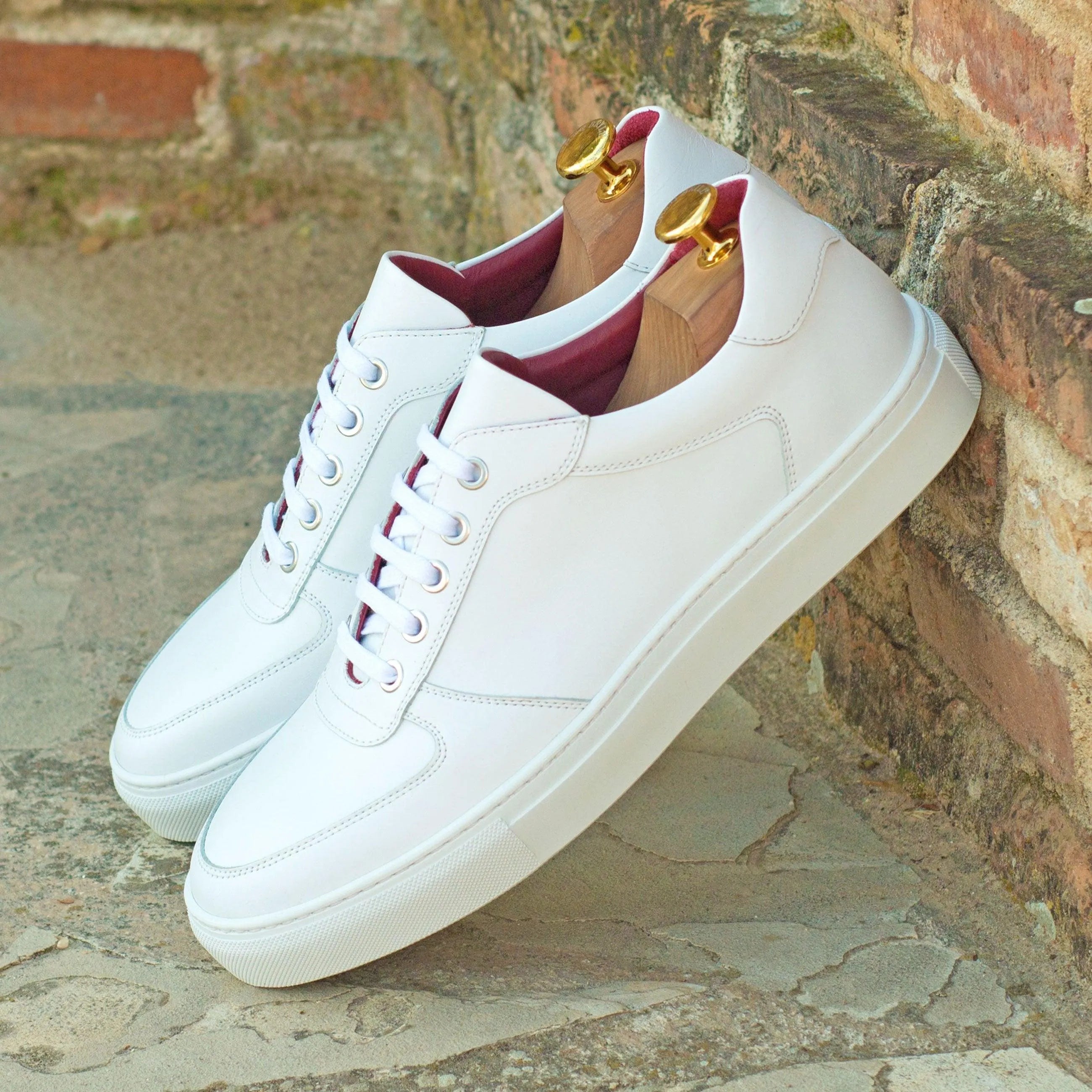 Pair of white leather Snow Trainer Sneakers II