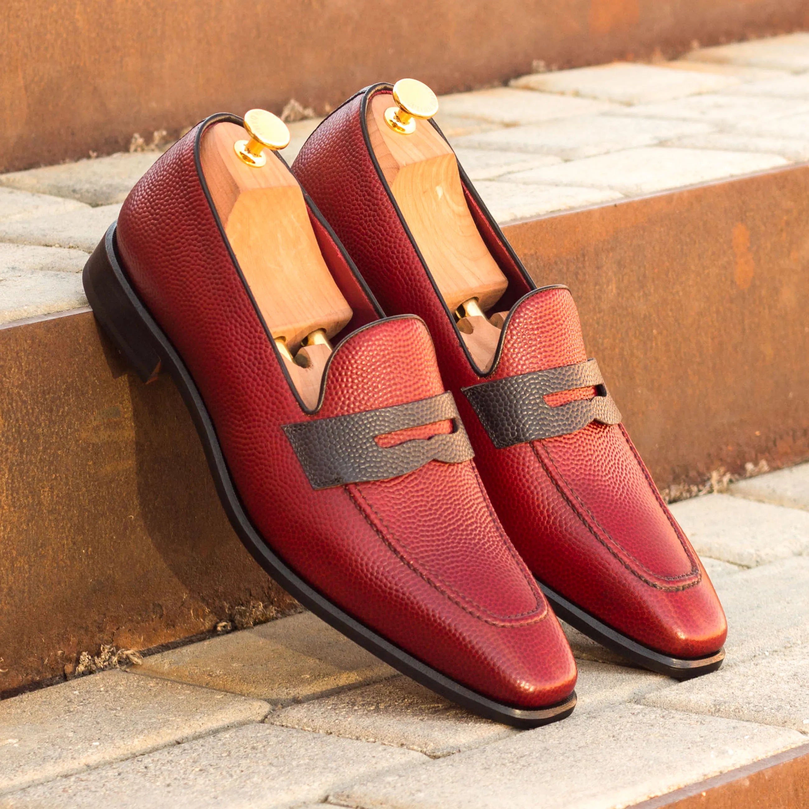 Pair of red pebble grain Tzu loafers, luxury bespoke shoes for men