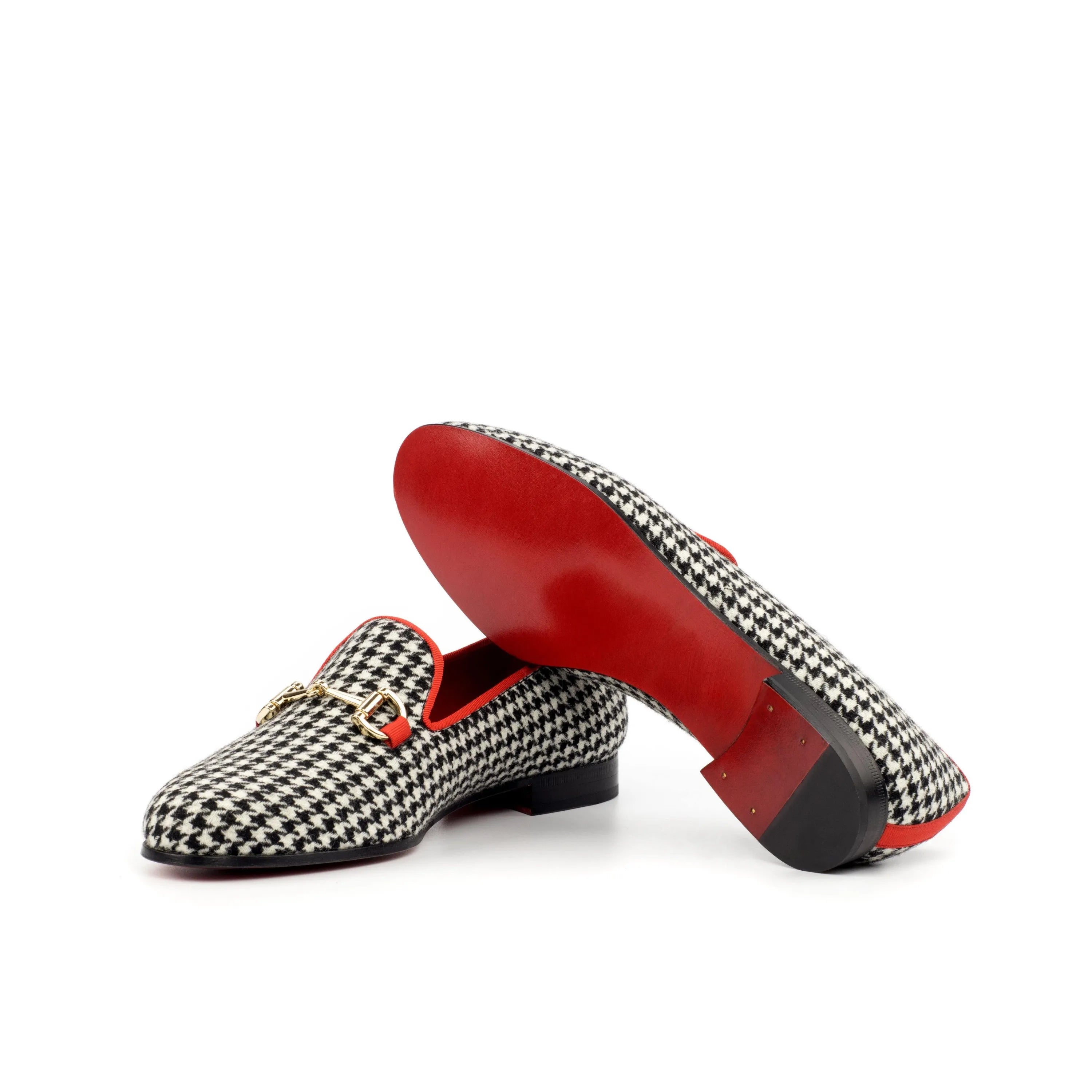 Vogue Audrey slipper with houndstooth pattern and red soles