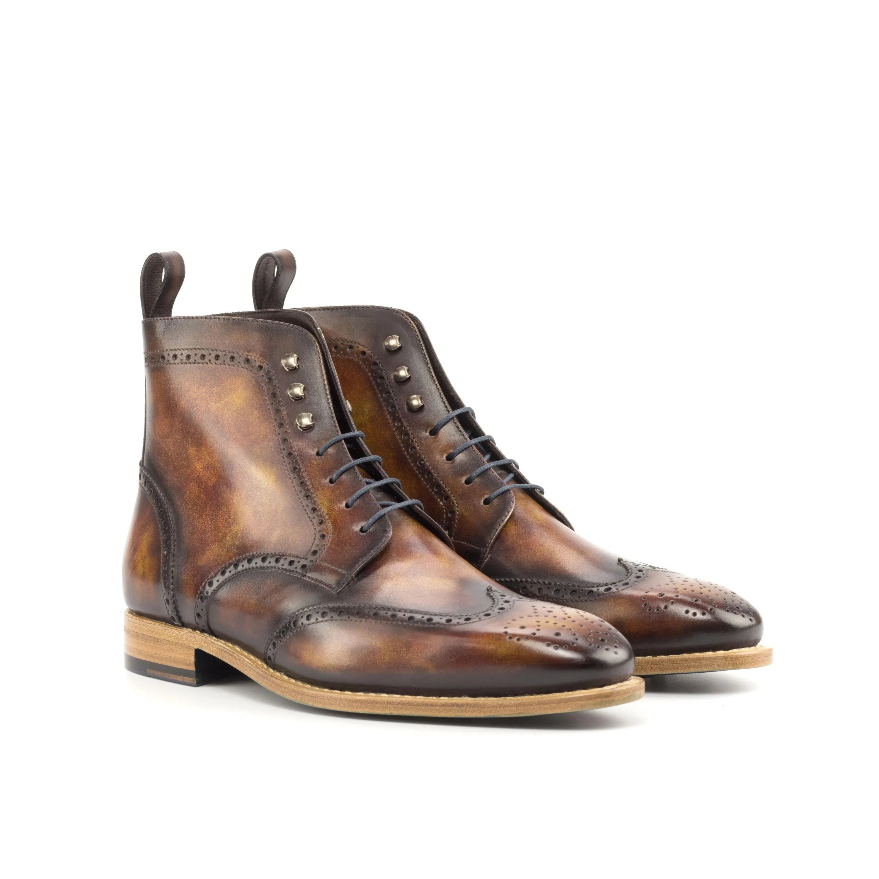 Wagner military brogue patina boots II in brown leather wingtip
