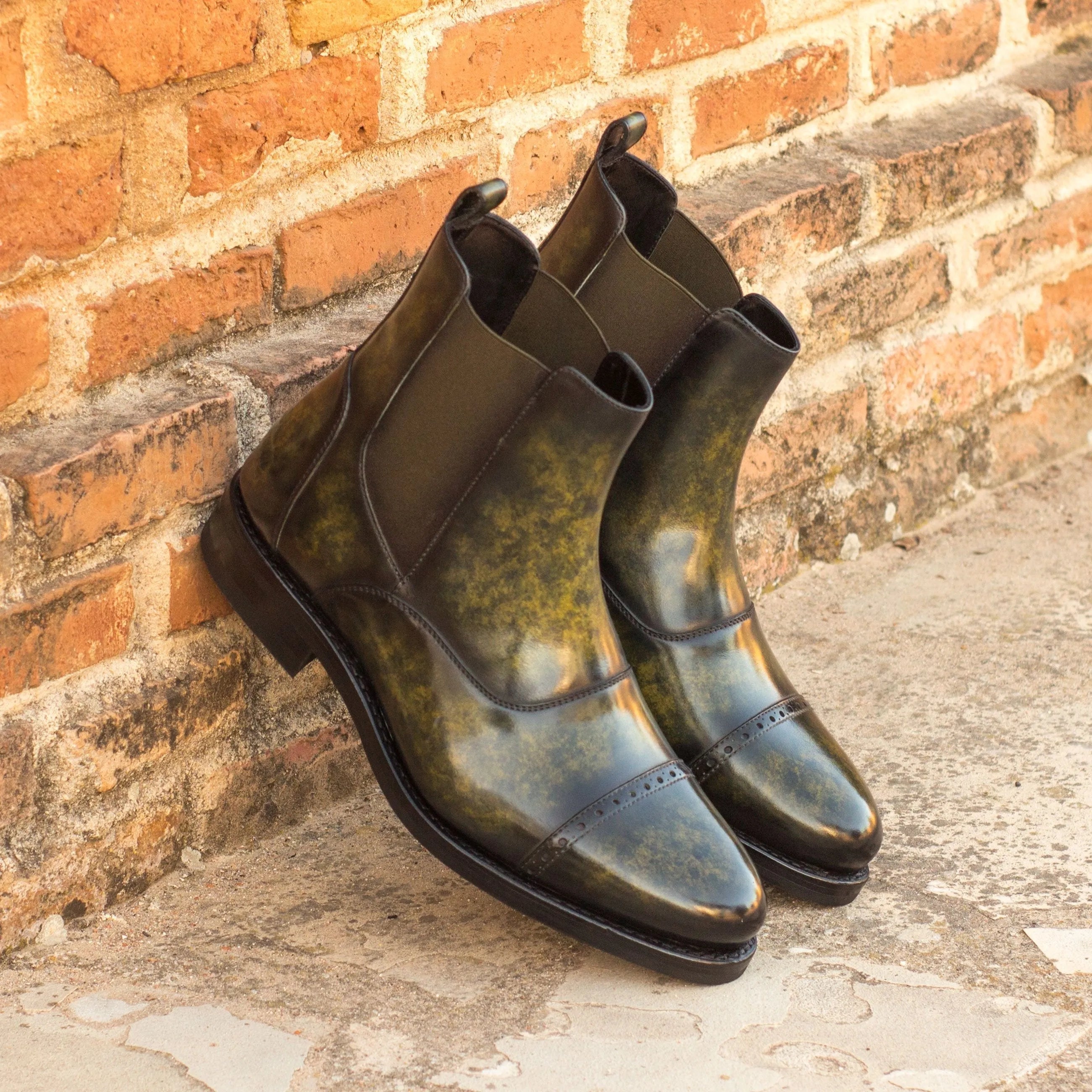 Pair of green leather Wardon Patina Chelsea boots