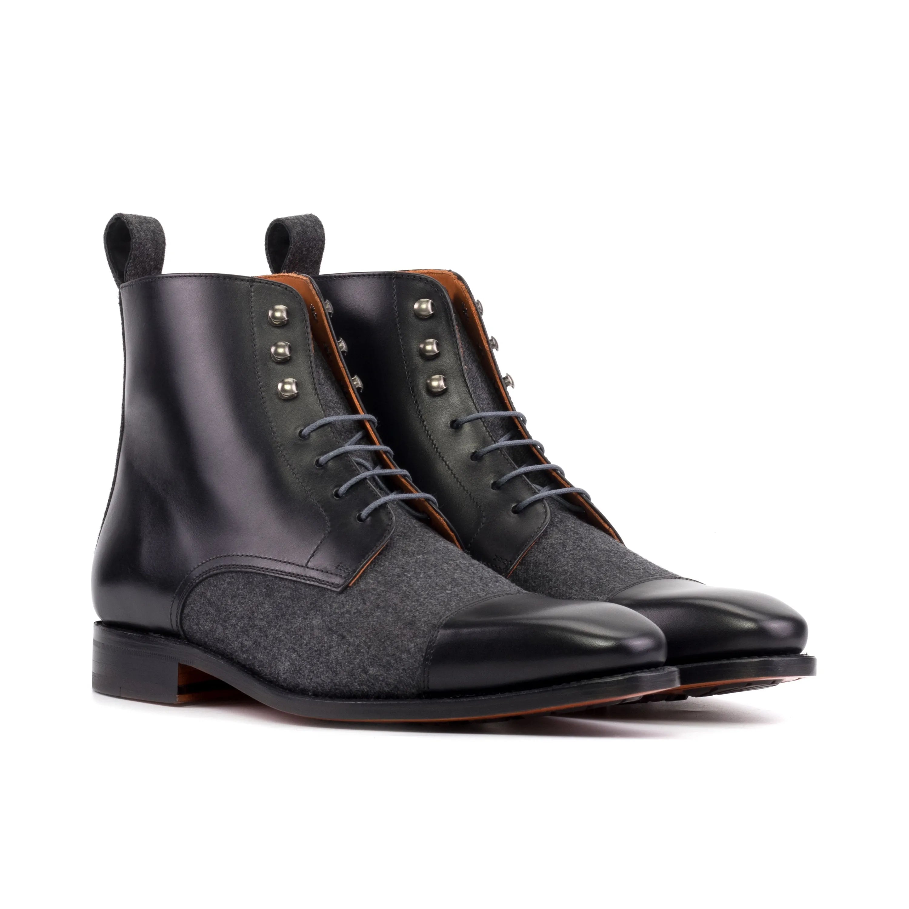 Zenobia jumper boots in black leather and gray tweed