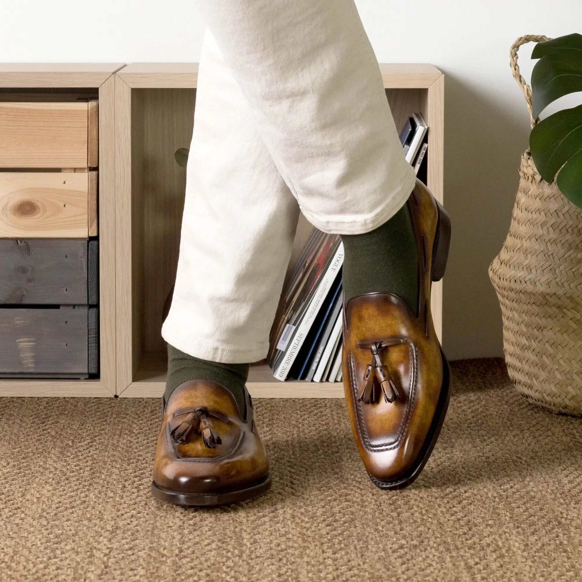 Brown leather tassel loafers.