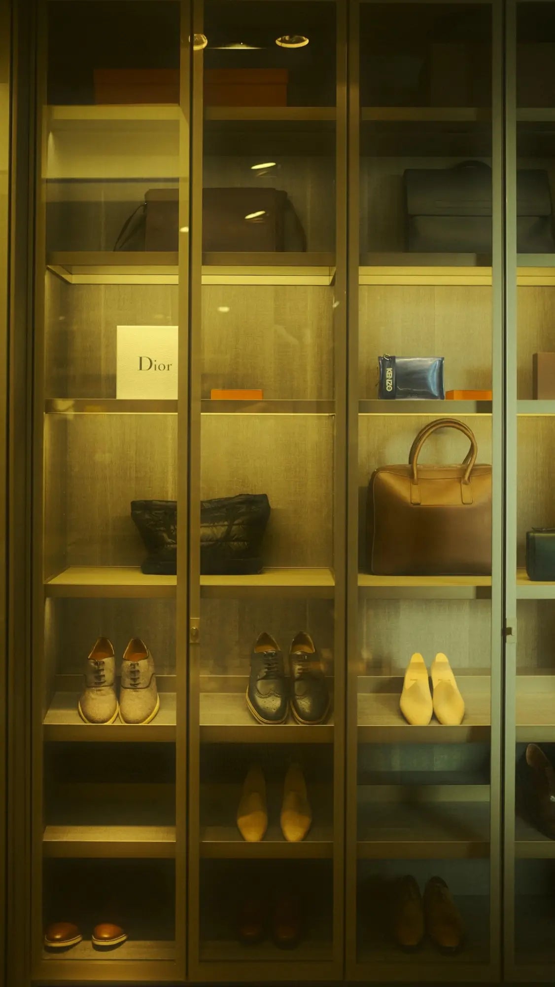 Dior leather handbag with gold hardware.