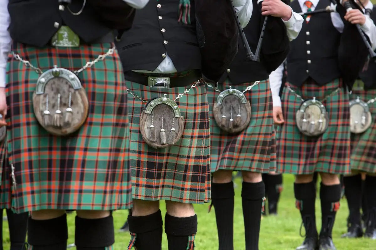 Men in kilts.