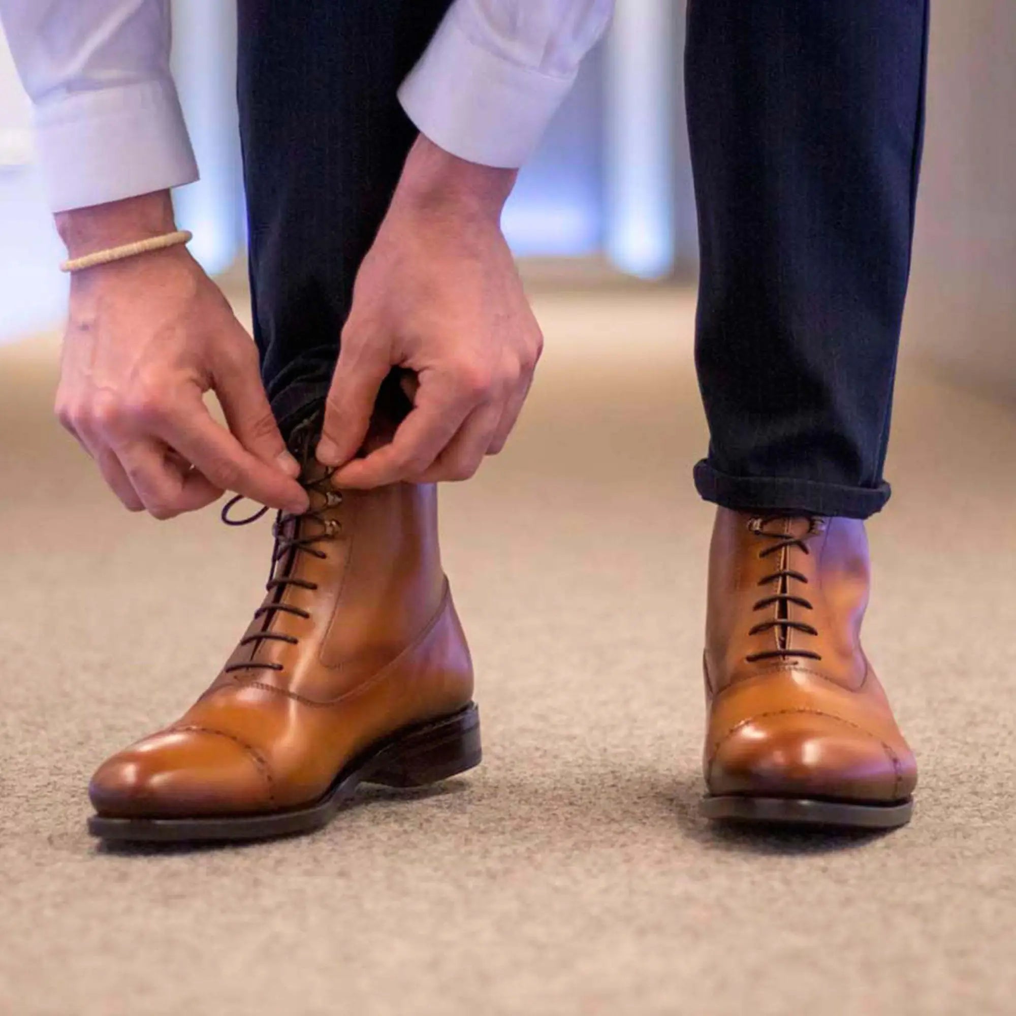 Brown leather lace-up boots.