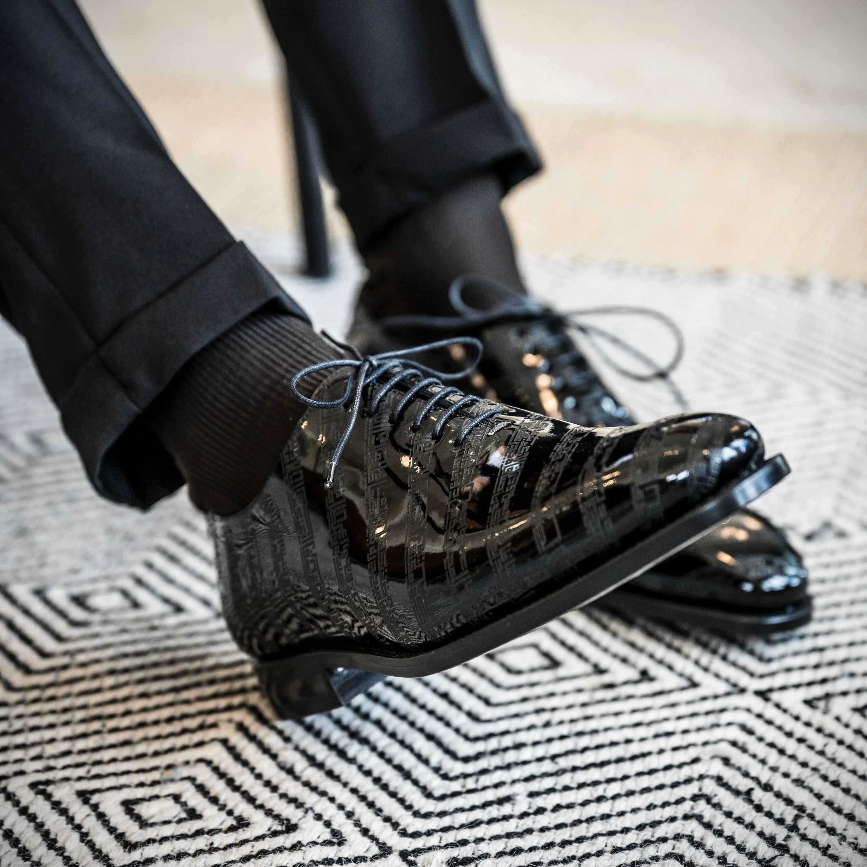 Shiny black patent leather Before The Throne wholecut shoes