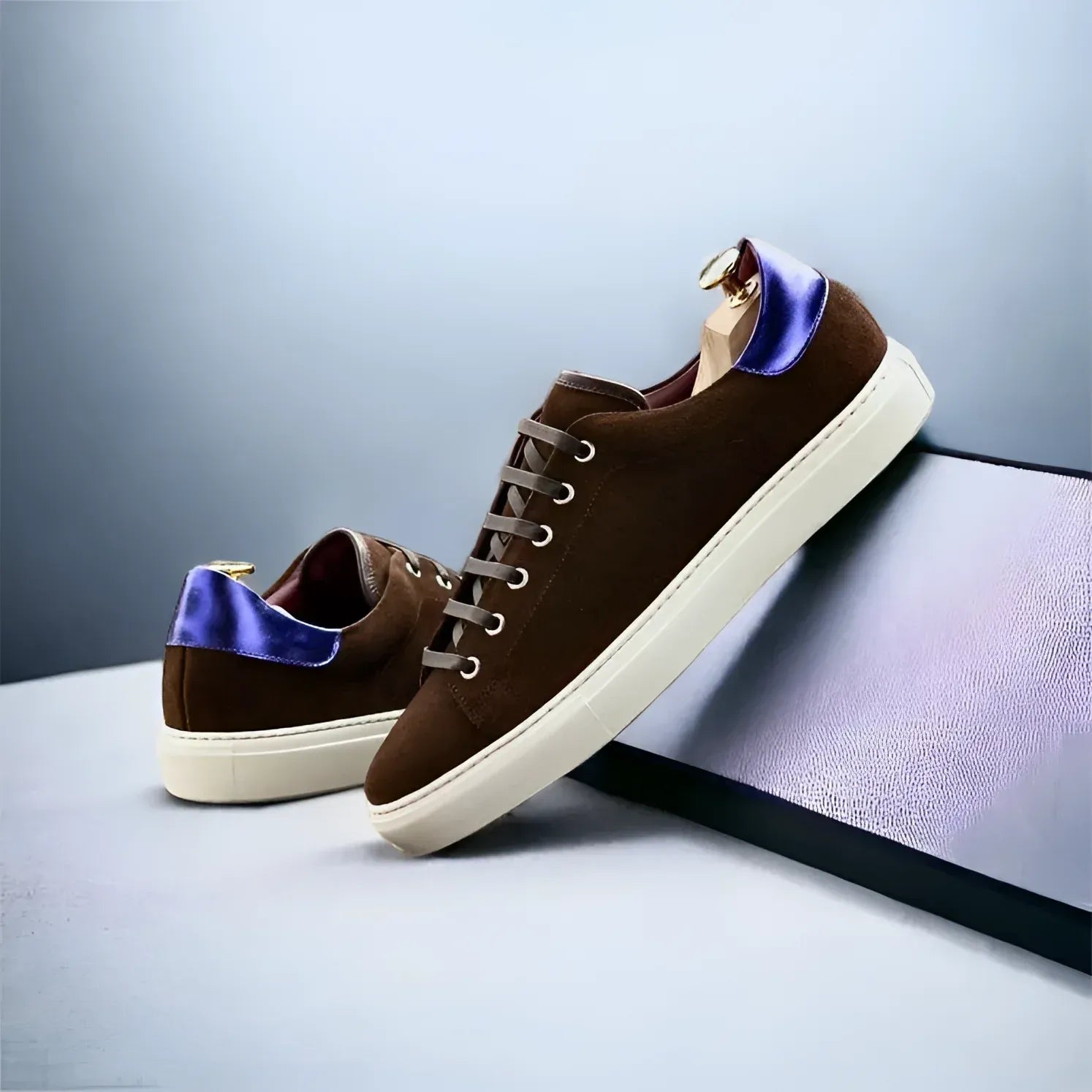 Back view of Beyond Trainer Sneaker in brown suede with blue heel detail