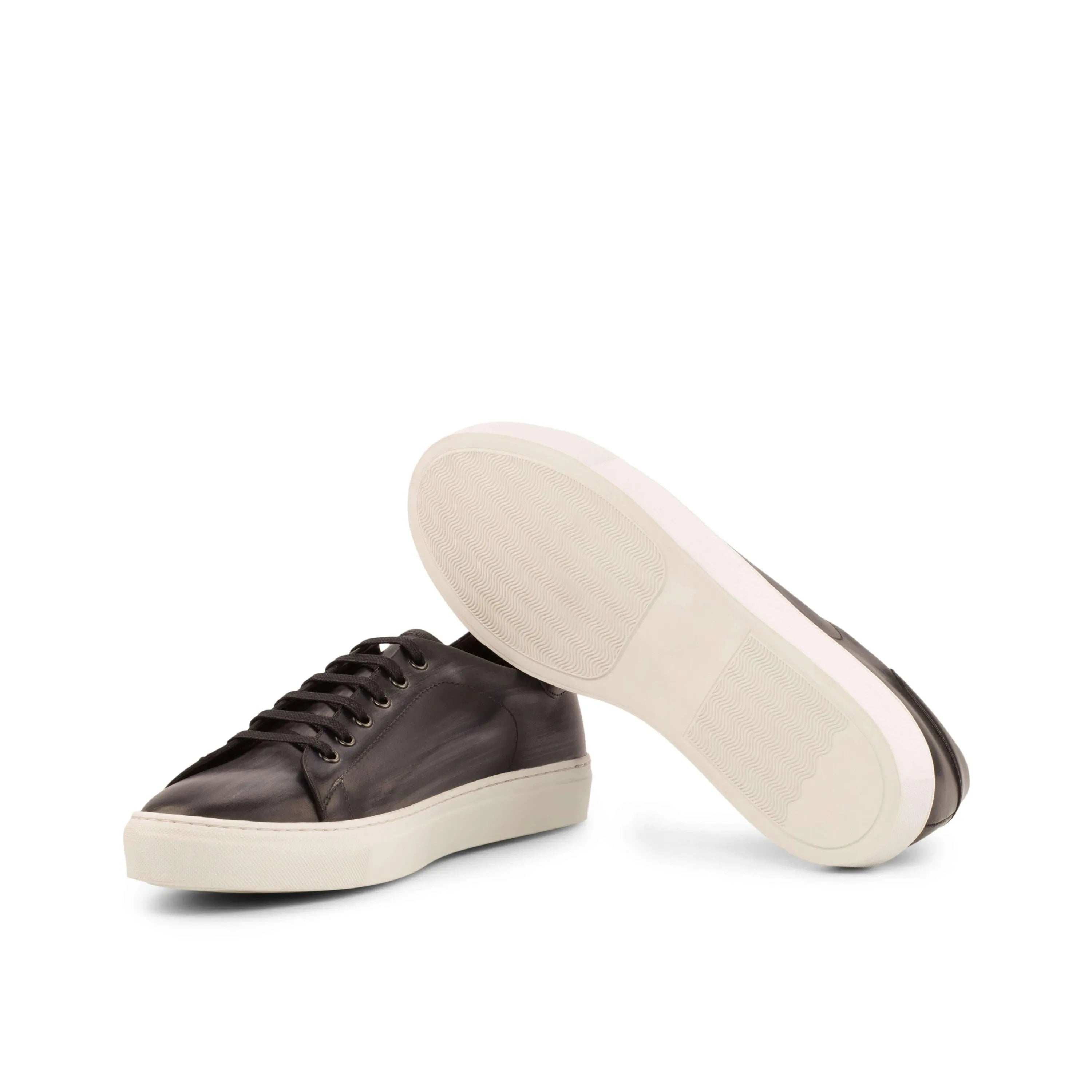 Pair of brown leather C68 trainer patina sneakers