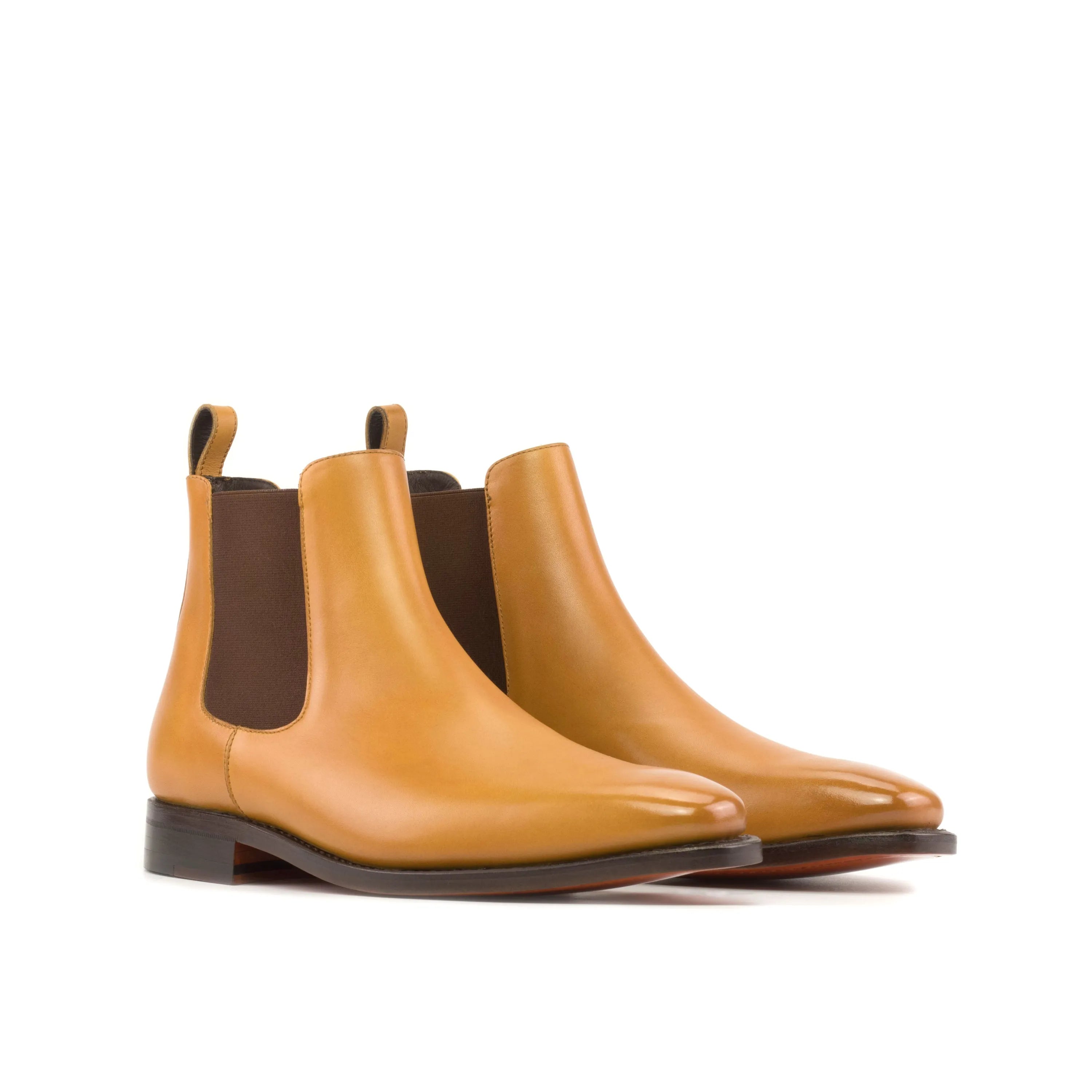 Pair of tan leather Canni Chelsea Boots in fast lane style