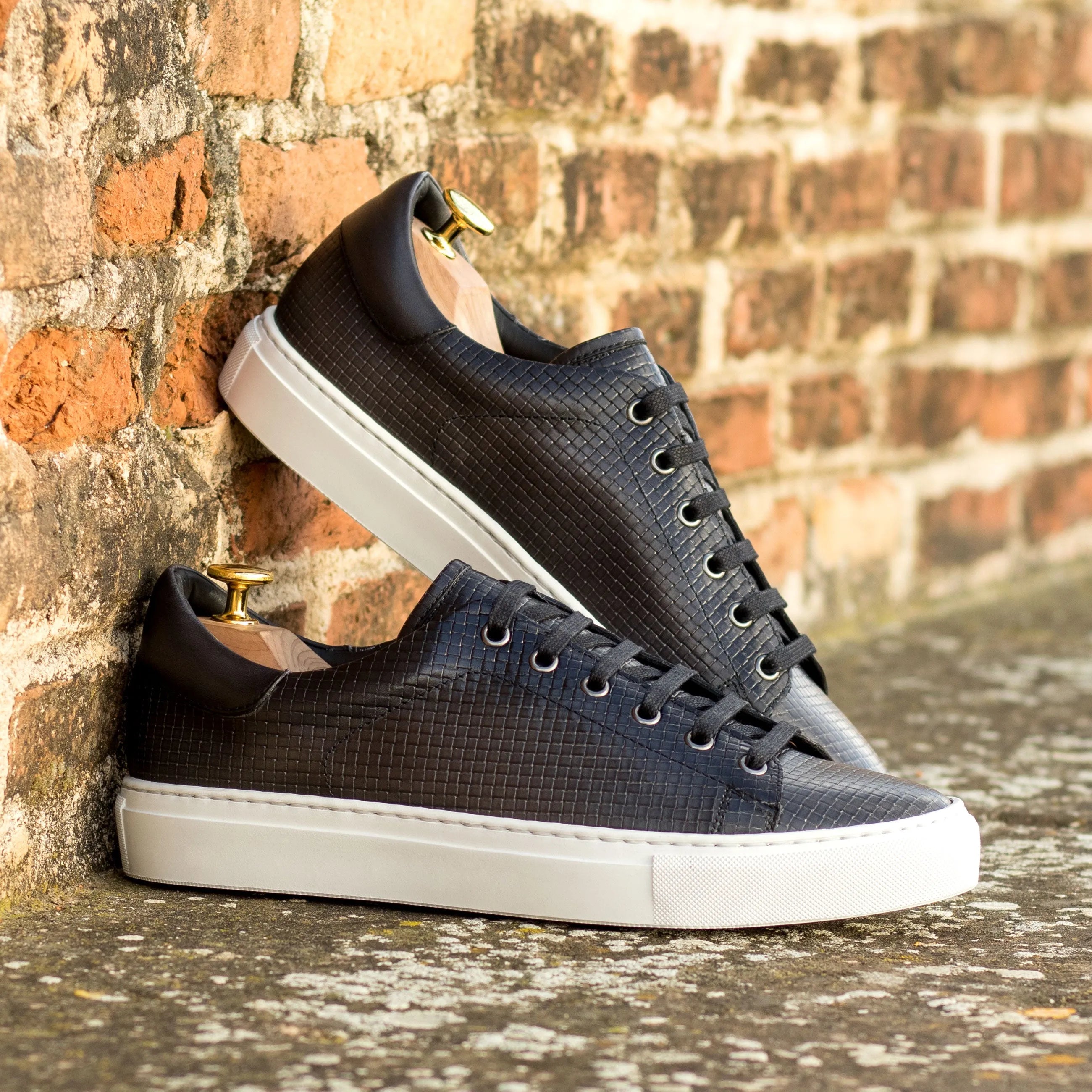 Black Corsa Trainer Sneaker with white soles and burnished grey cupsole