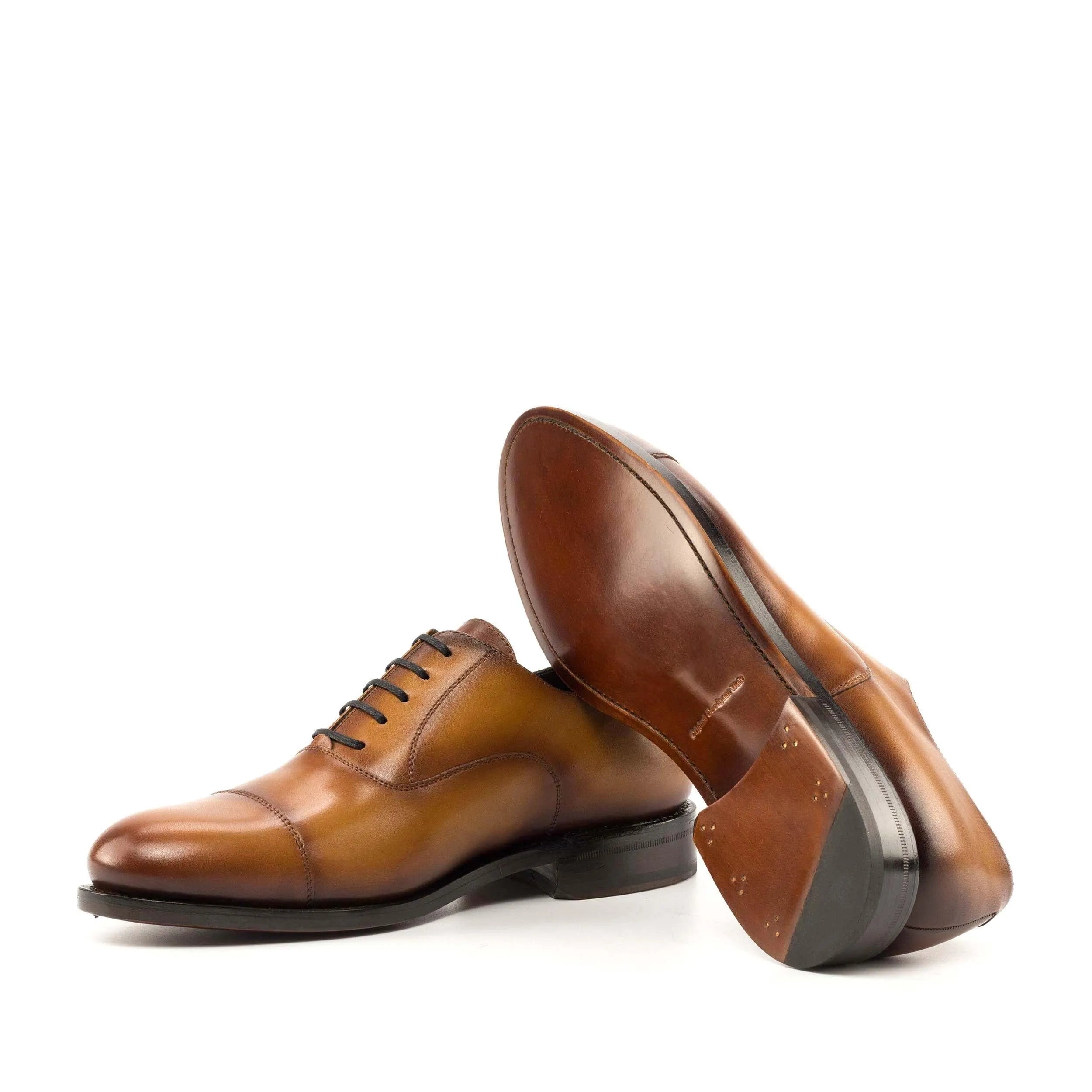 Pair of brown leather Georgy Oxford shoes II in fast lane style