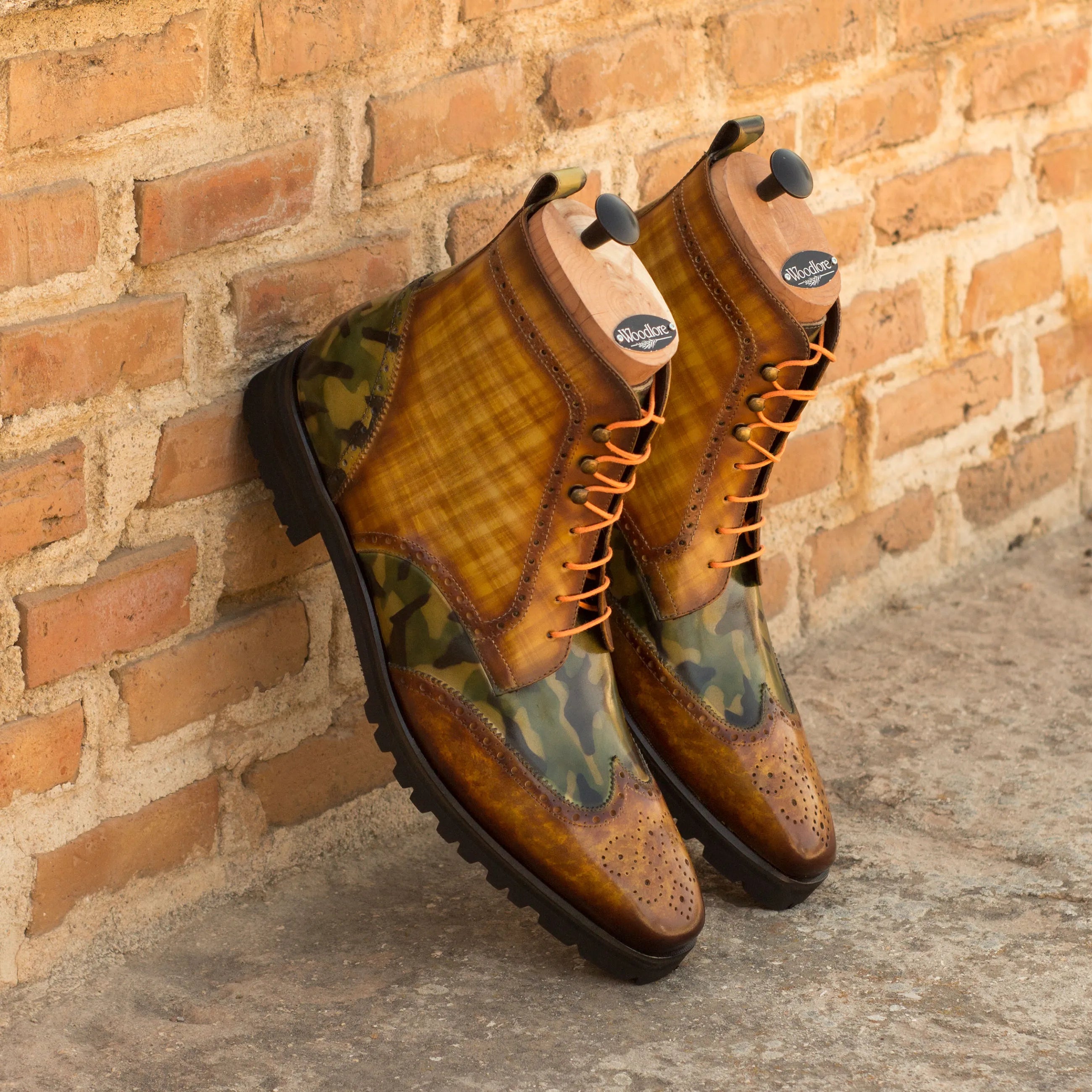 Goodlife military brogue boots in two-tone leather wingtip design