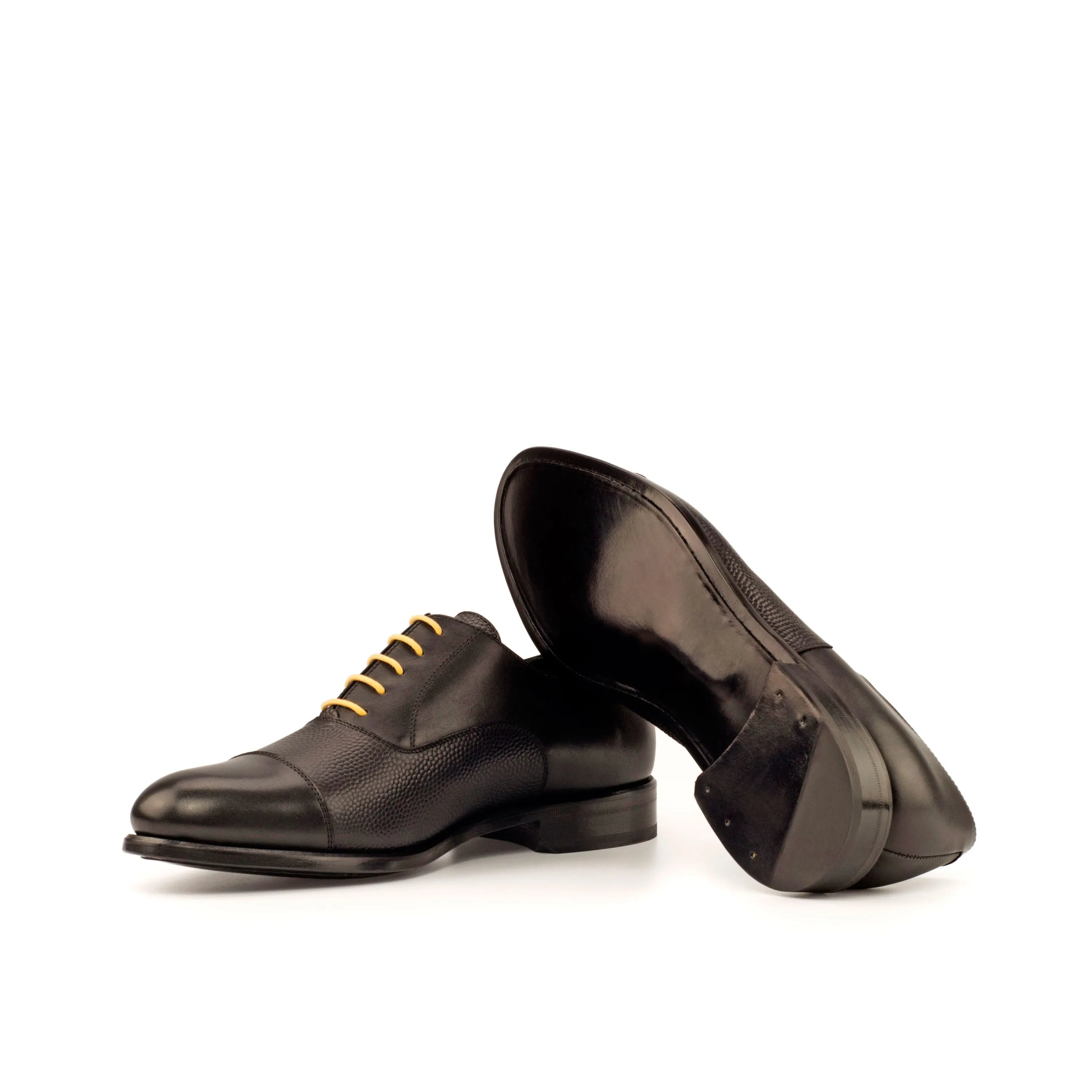 Pair of black leather Honon Oxford shoes
