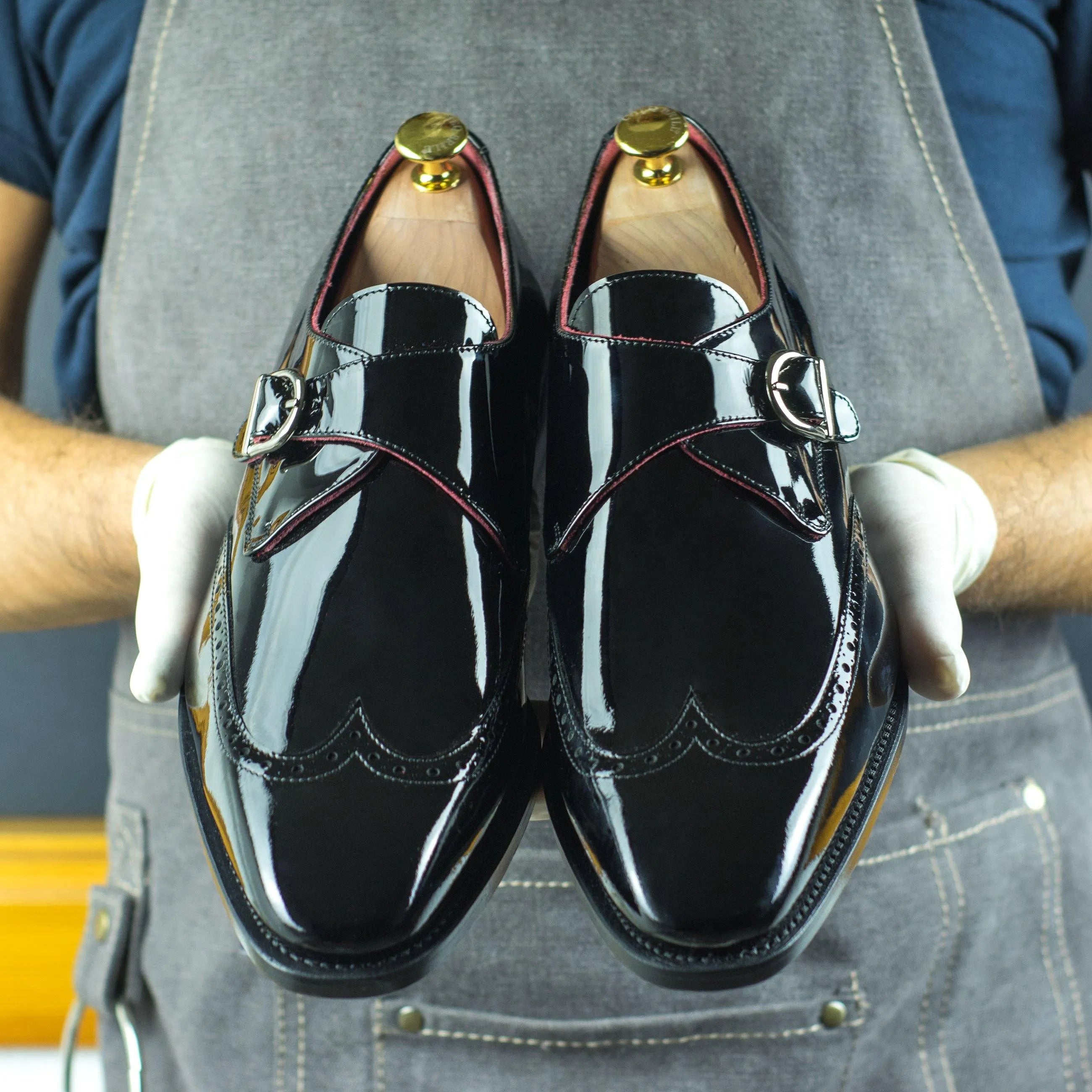 Shiny black Hugh single monk shoes back view