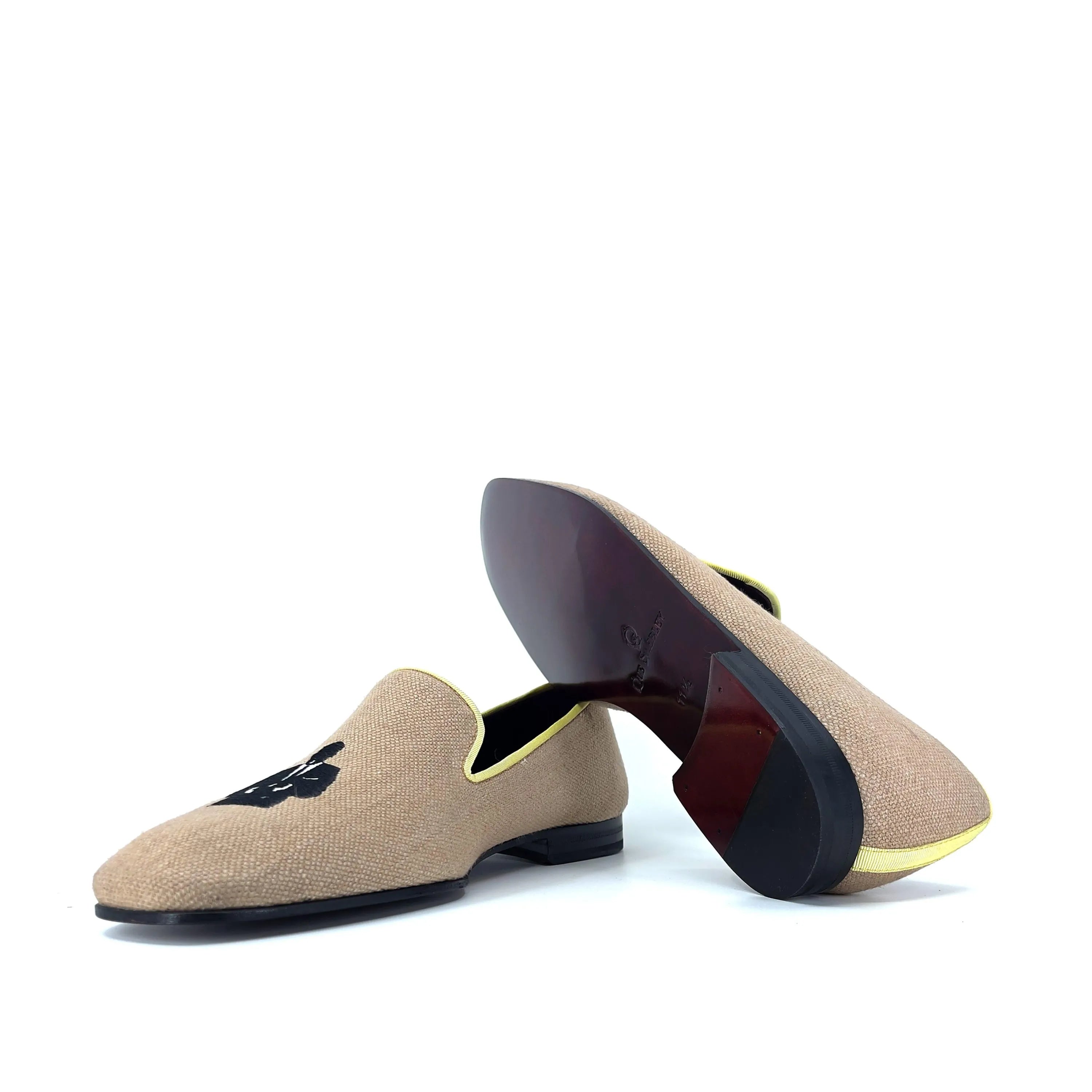 Tan Lane Drake Slipon II loafers with black embroidery on tan linen