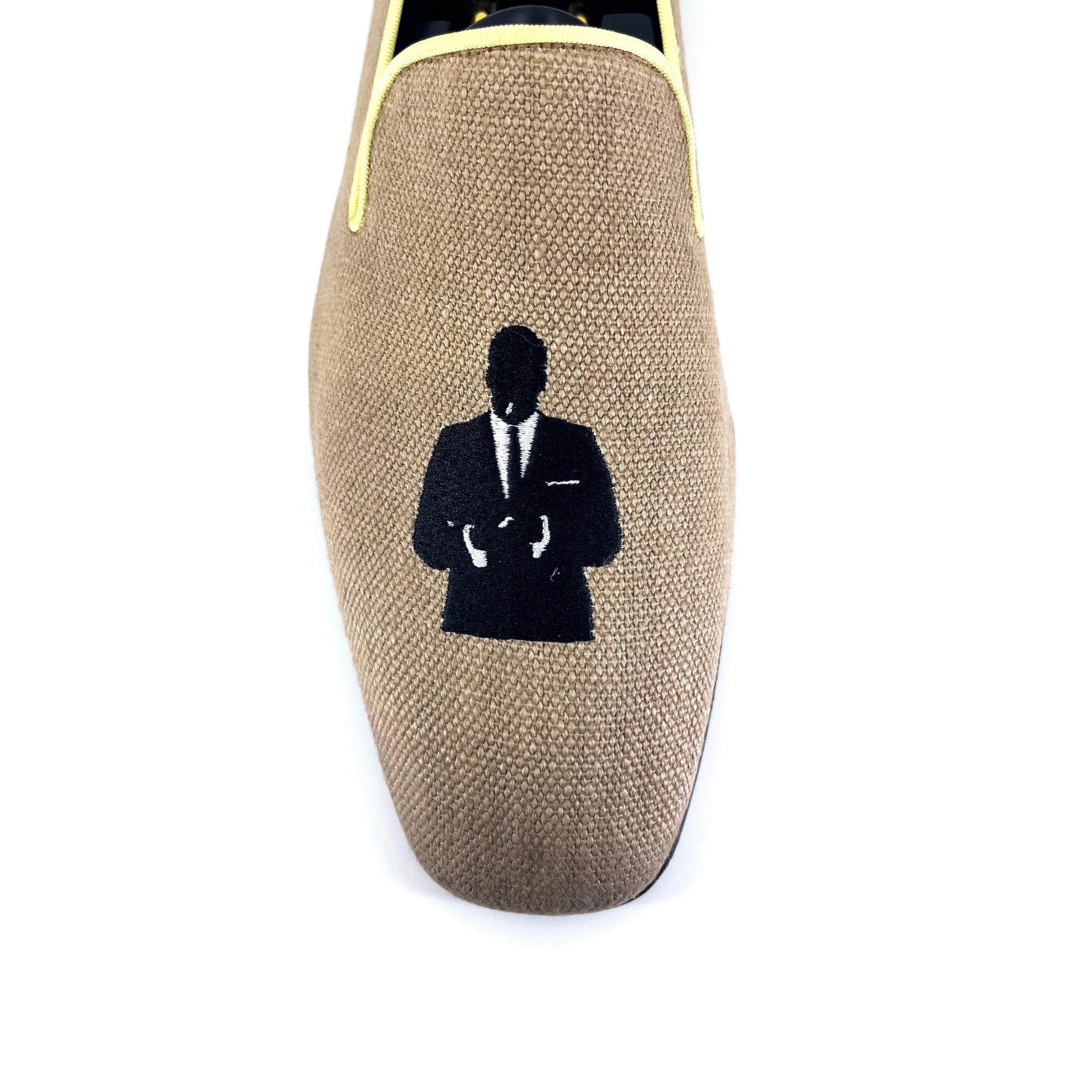 Tan Lane Drake Slipon II loafer with black embroidery suit silhouette