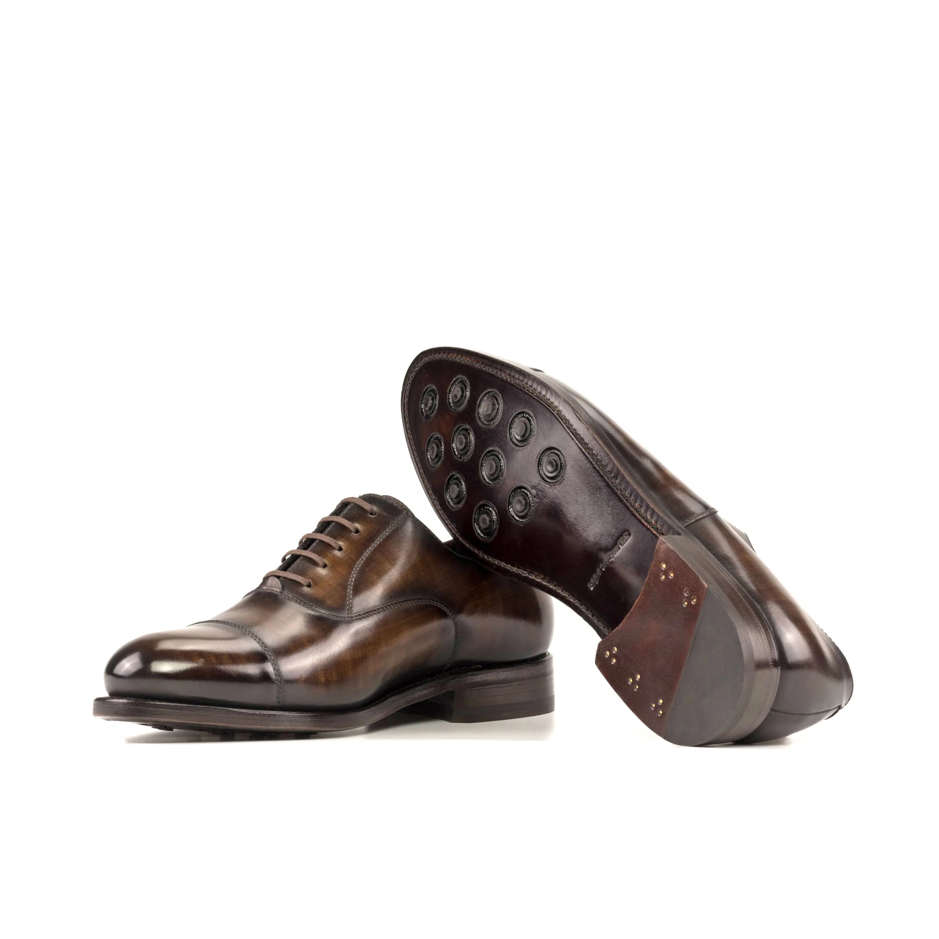 Pair of brown leather Mavrick Patina Oxford shoes