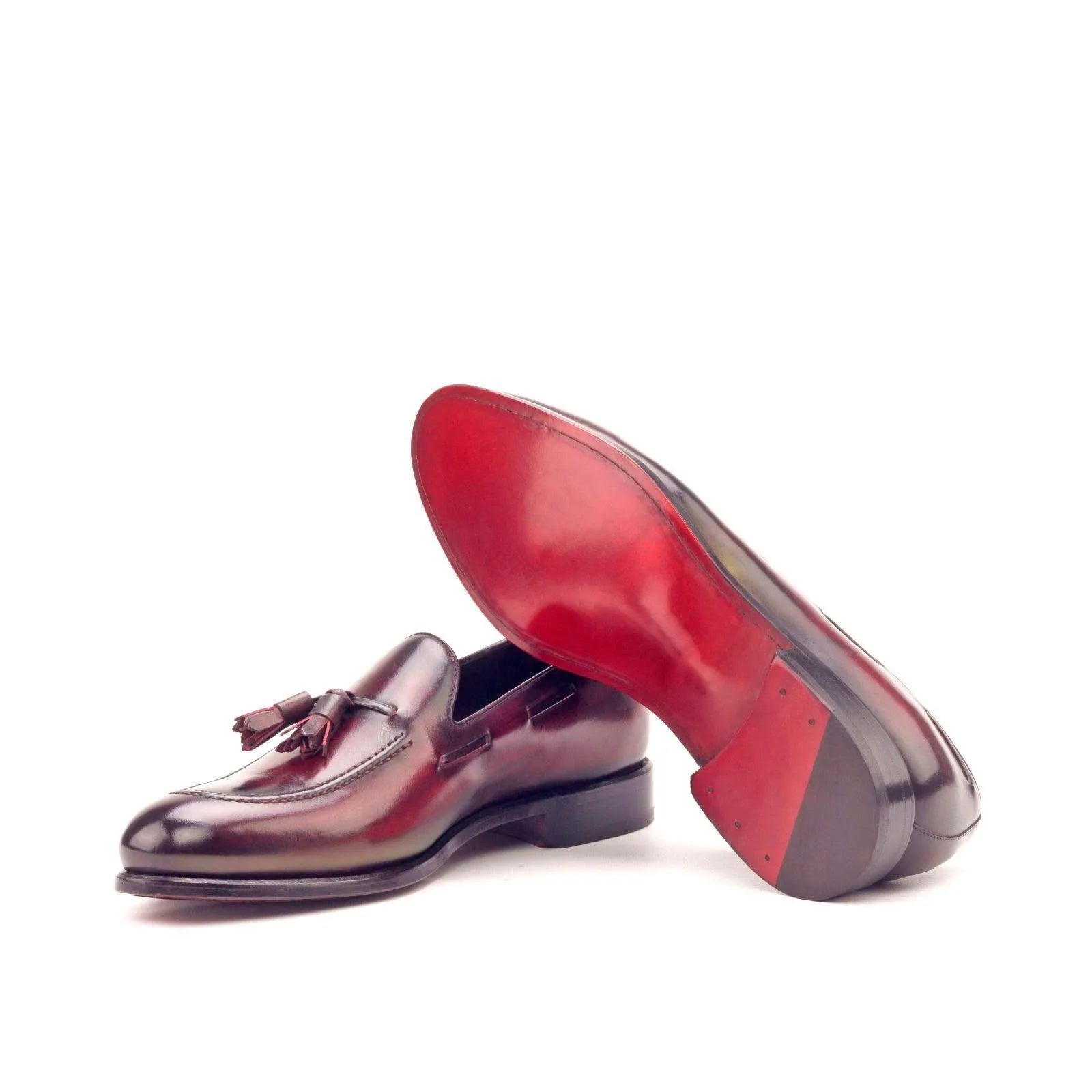 MDF Patina loafers in burgundy leather with tassels and red soles