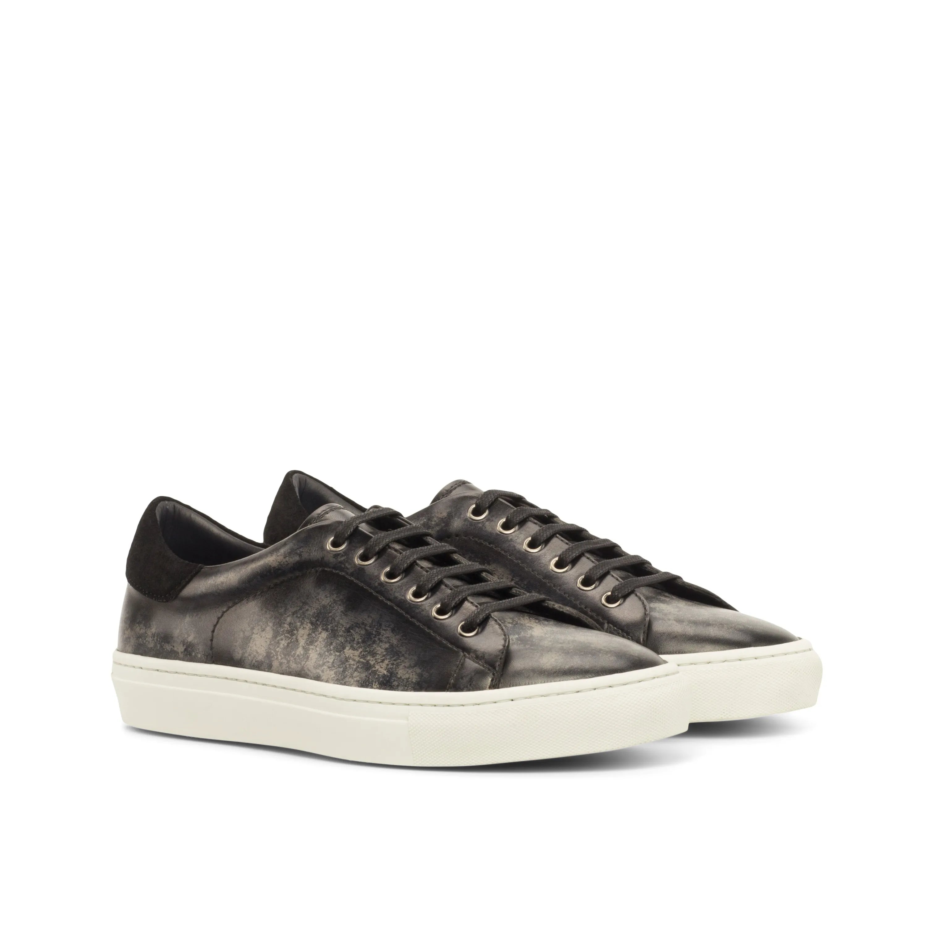 Pair of gray leather Nira Trainer Patina sneakers