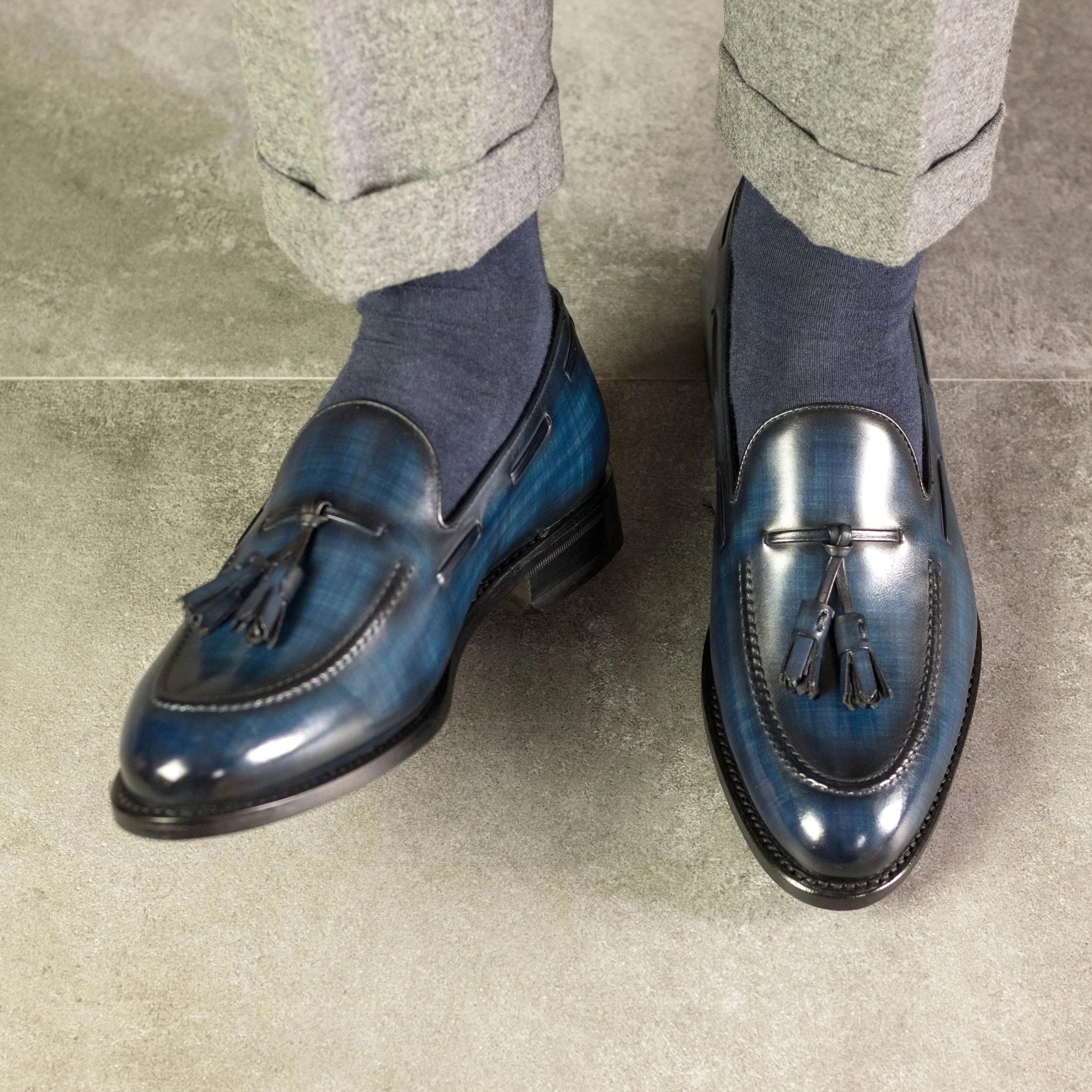 Blue leather tassel Qal Patina loafers, back view