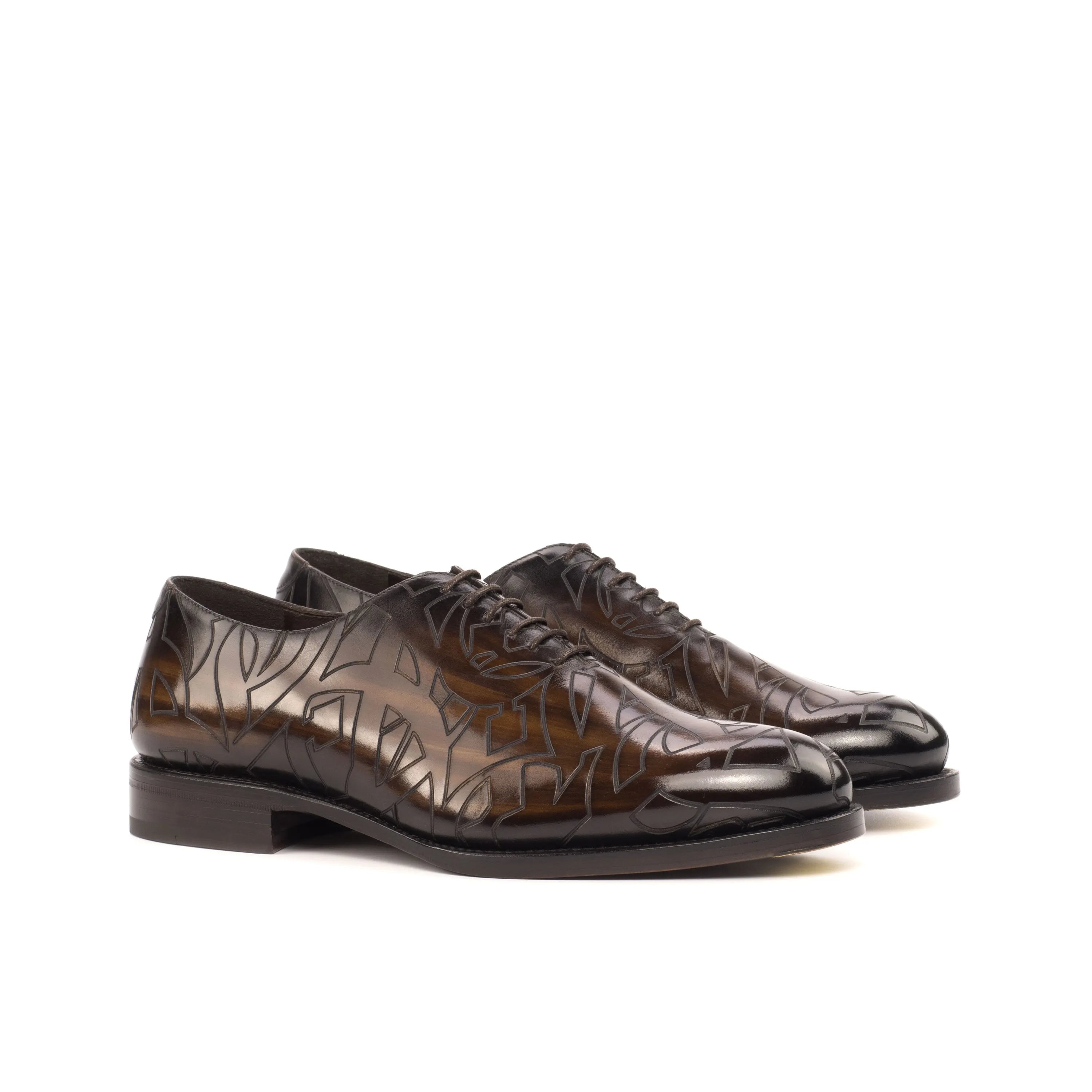 Quswa patina wholecut shoes in brown leather with fiddled waist