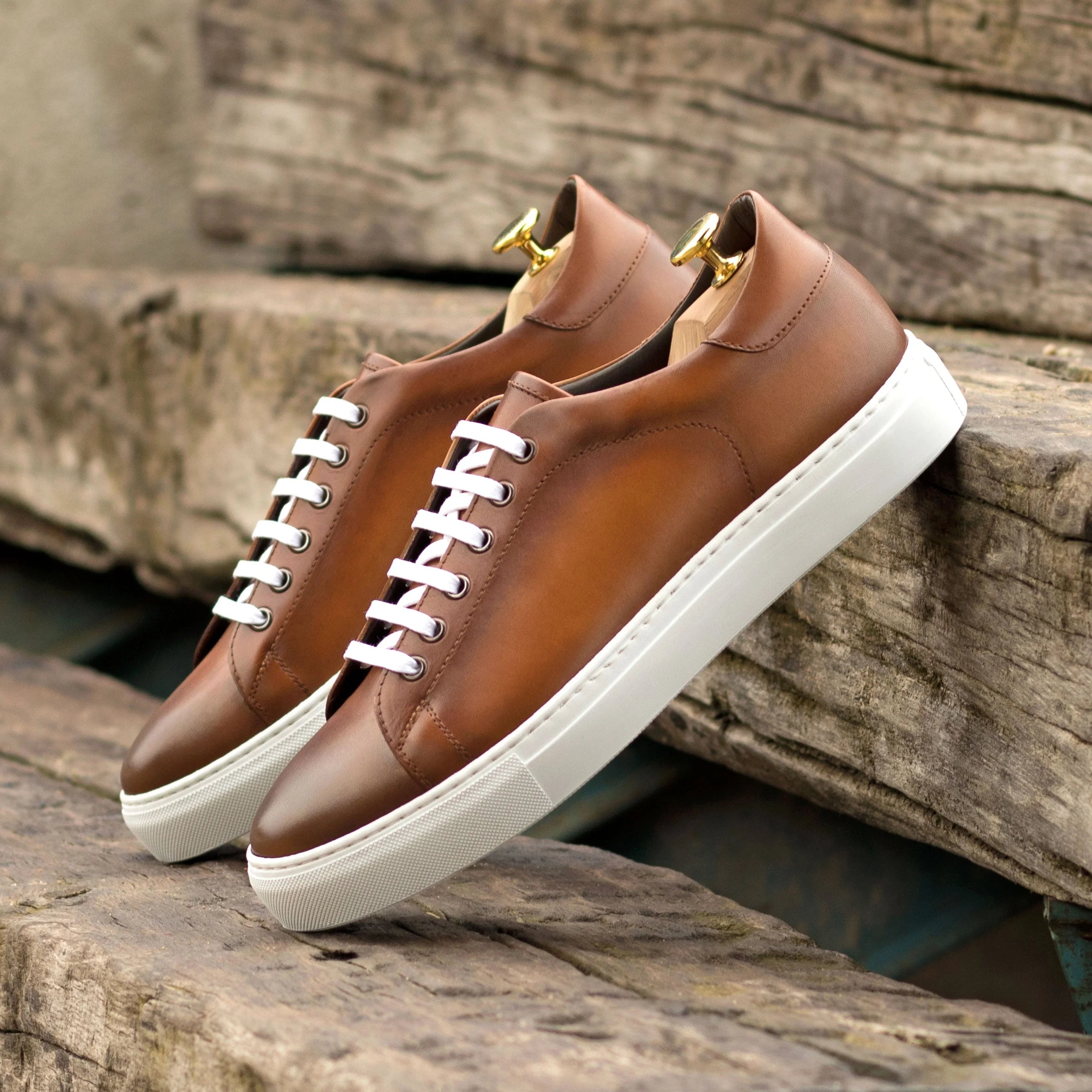 Treasure Trainer cupsole trainer in brown calf leather with white laces
