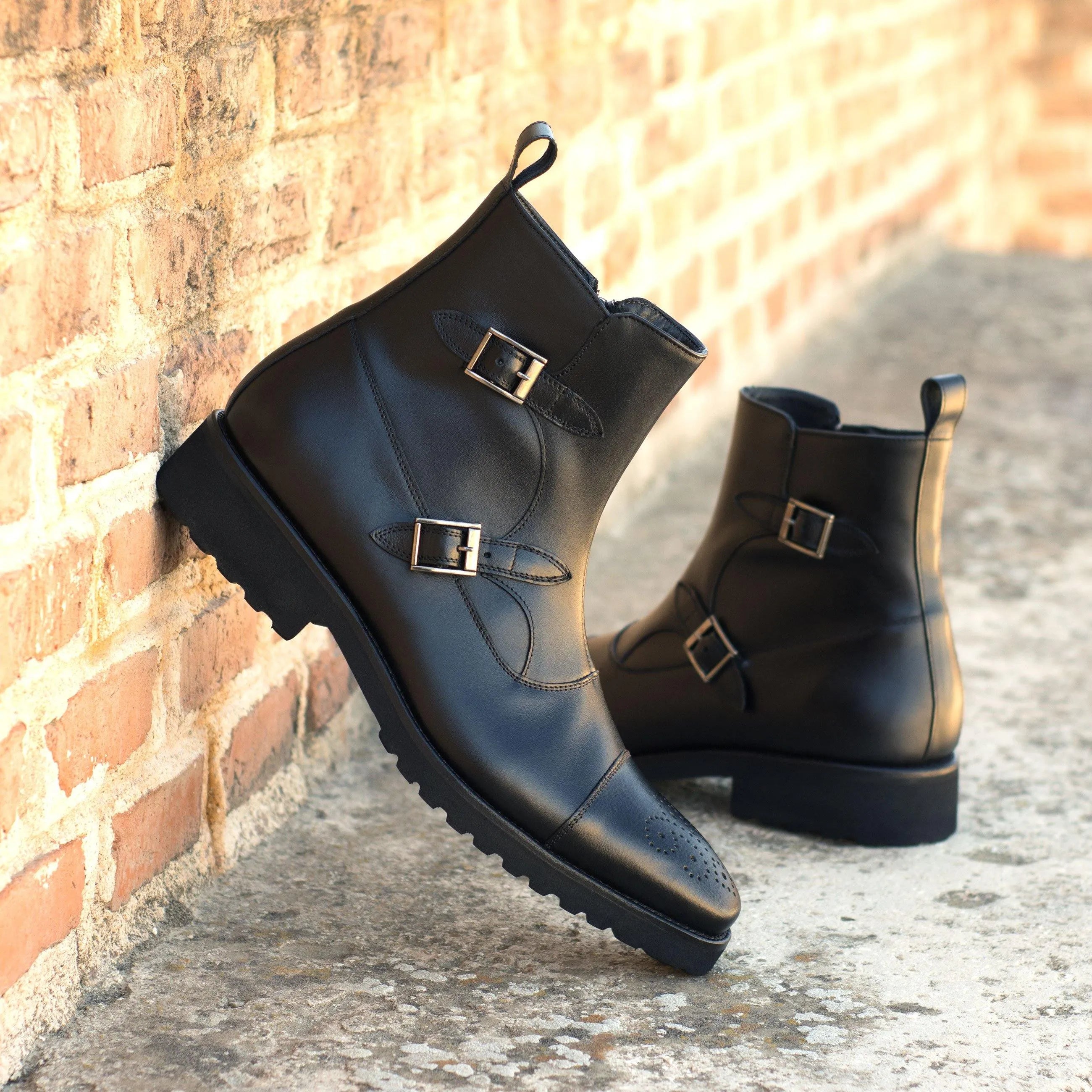 Black leather Tulum Octavian boots with monk straps