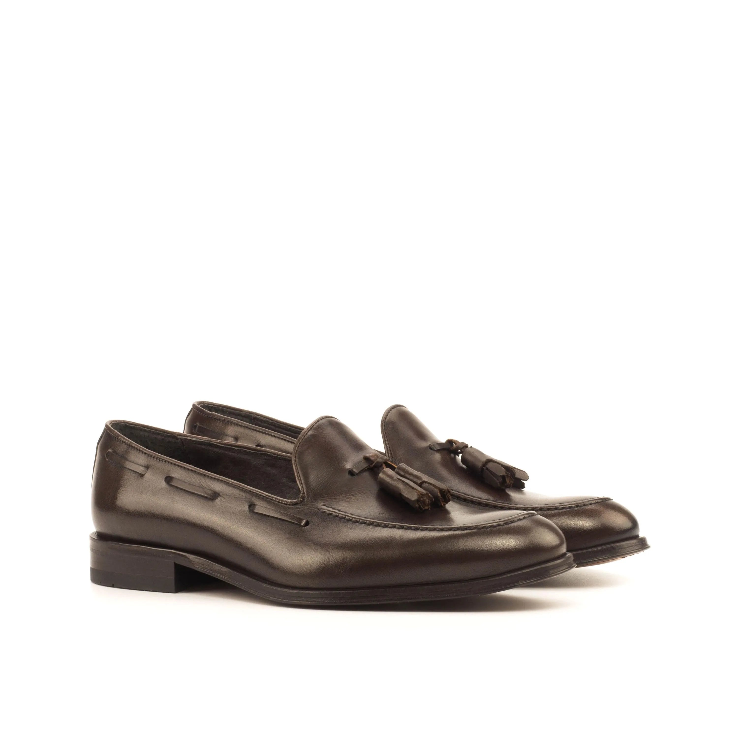 Dark brown Wachiwi Loafers II with rounded toe and leather tassels
