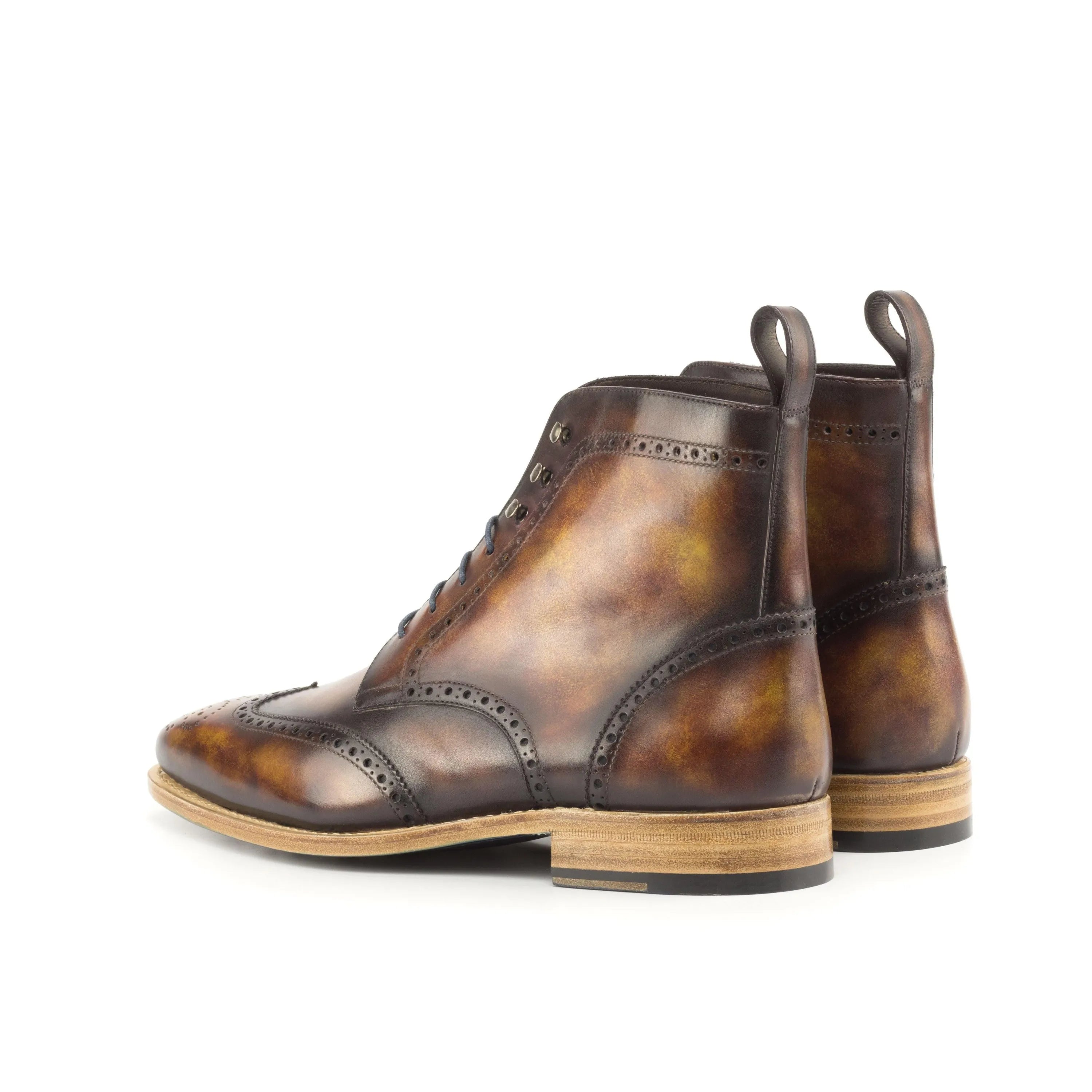 Wagner military brogue patina boots II in brown leather wingtip